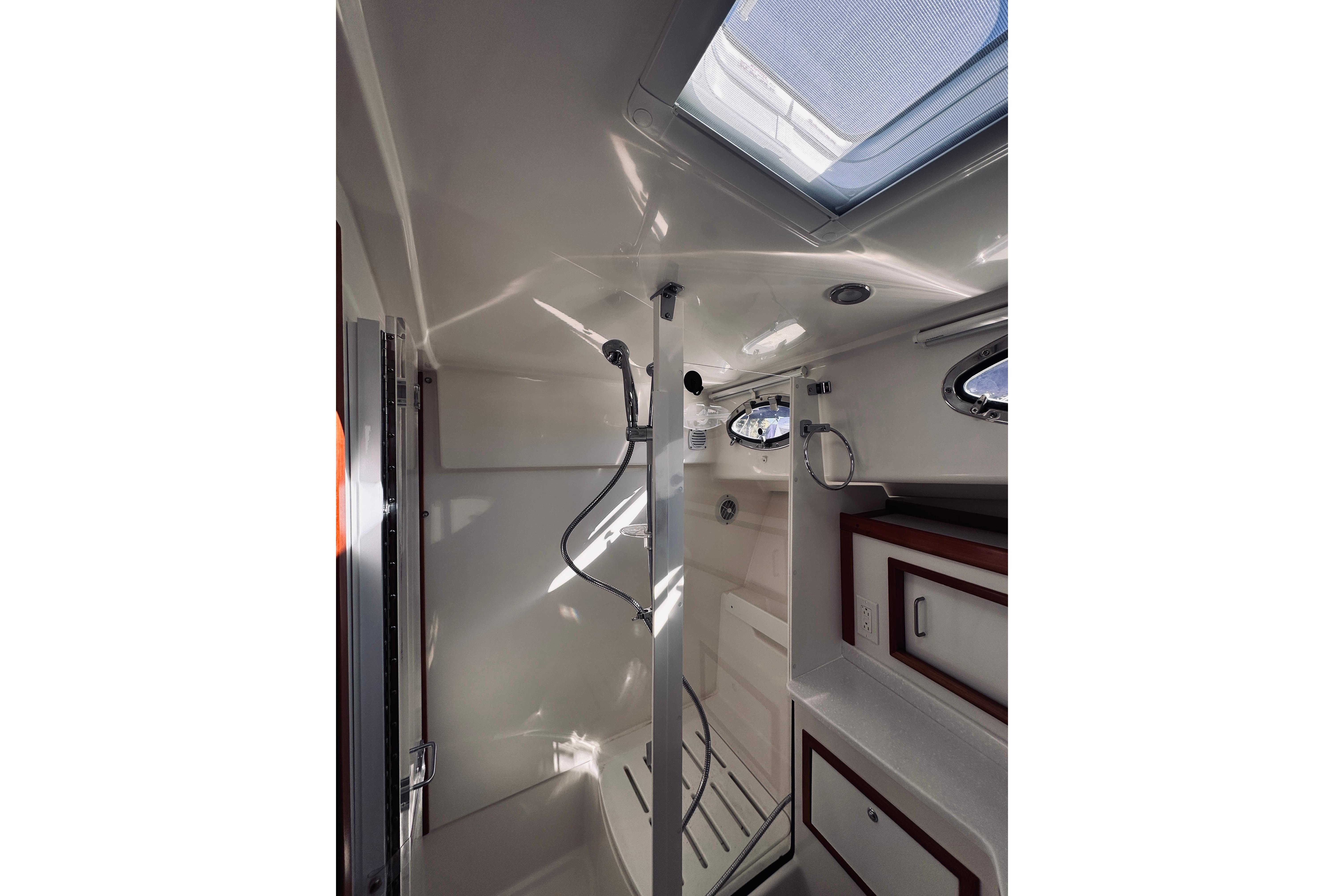 2021 Back Cove 37 yacht bathroom with modern shower and sleek design.