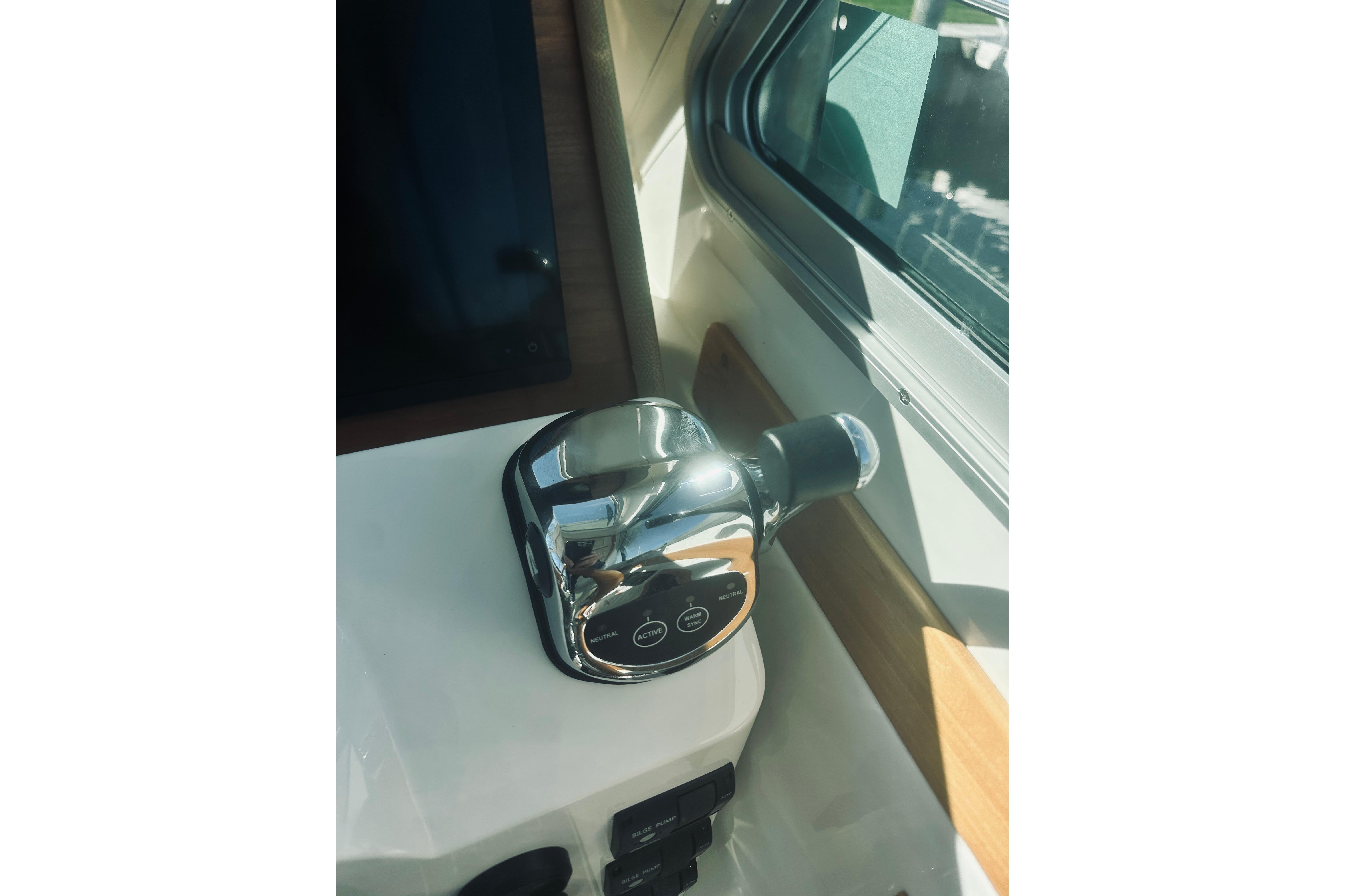 Control panel of a 2021 Back Cove 37 boat, featuring sleek design and modern controls.