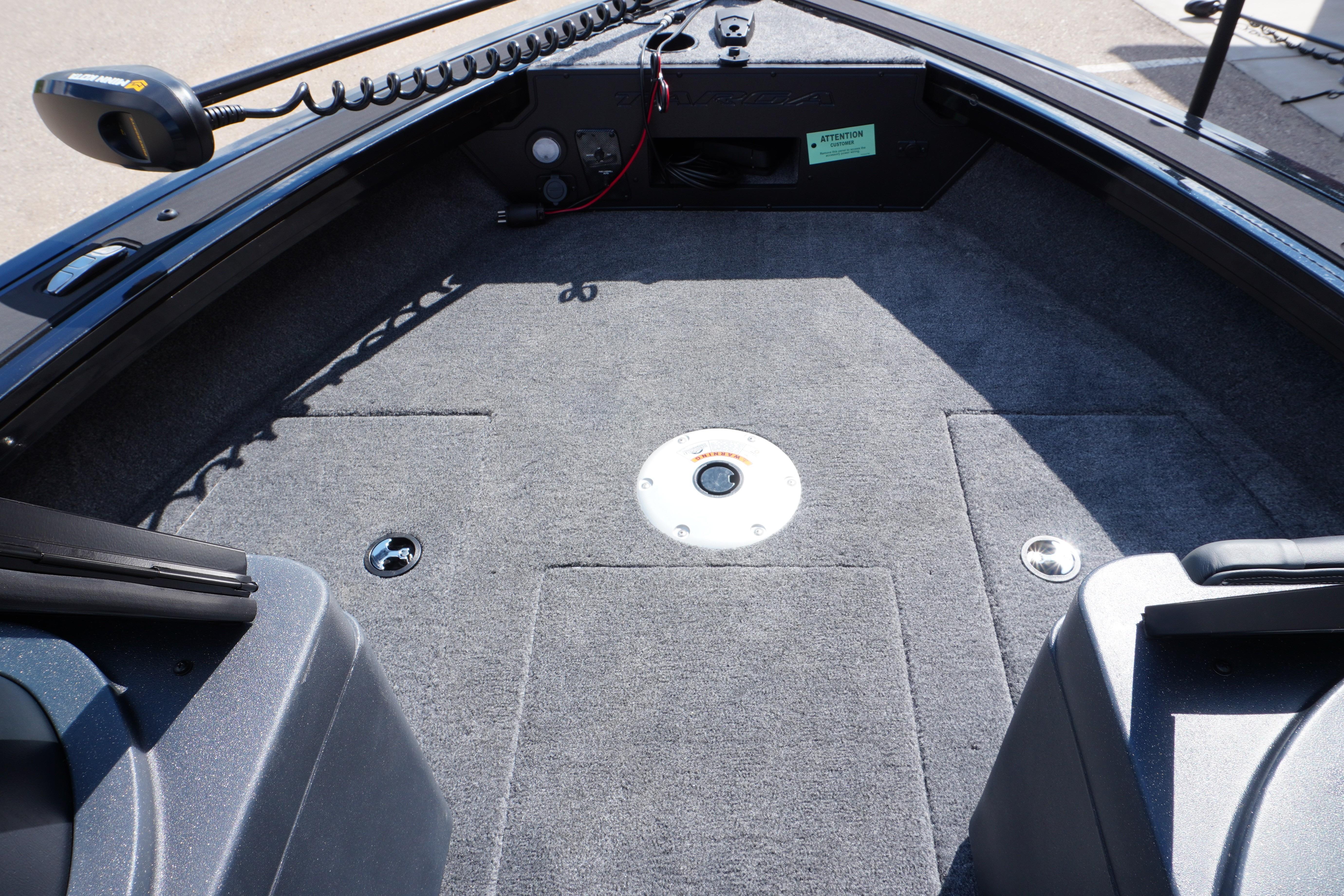 2026 Tracker Targa V-18 WT boat interior with carpeted deck and seating area.