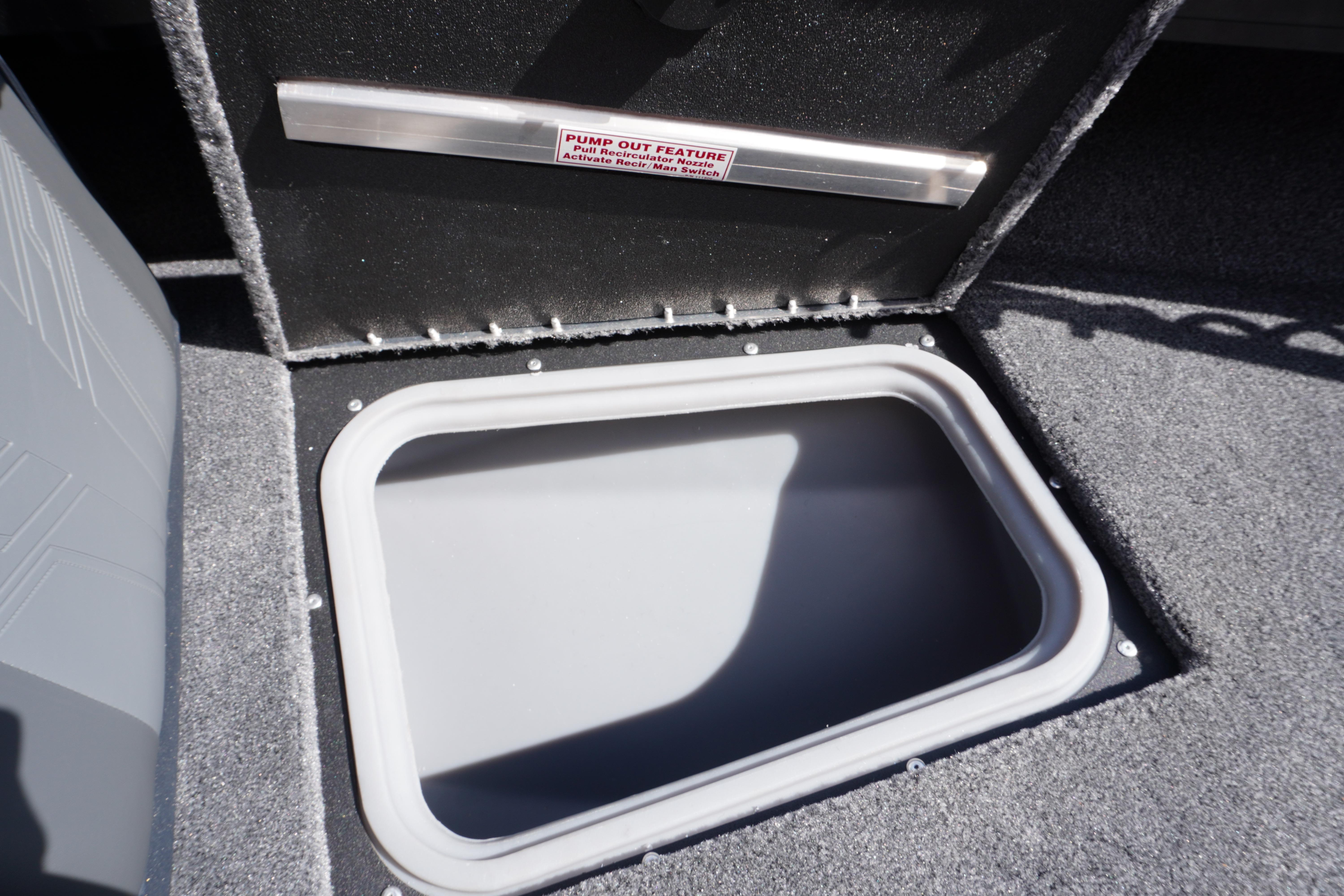 Open storage compartment in 2026 Tracker Targa V-18 WT boat.