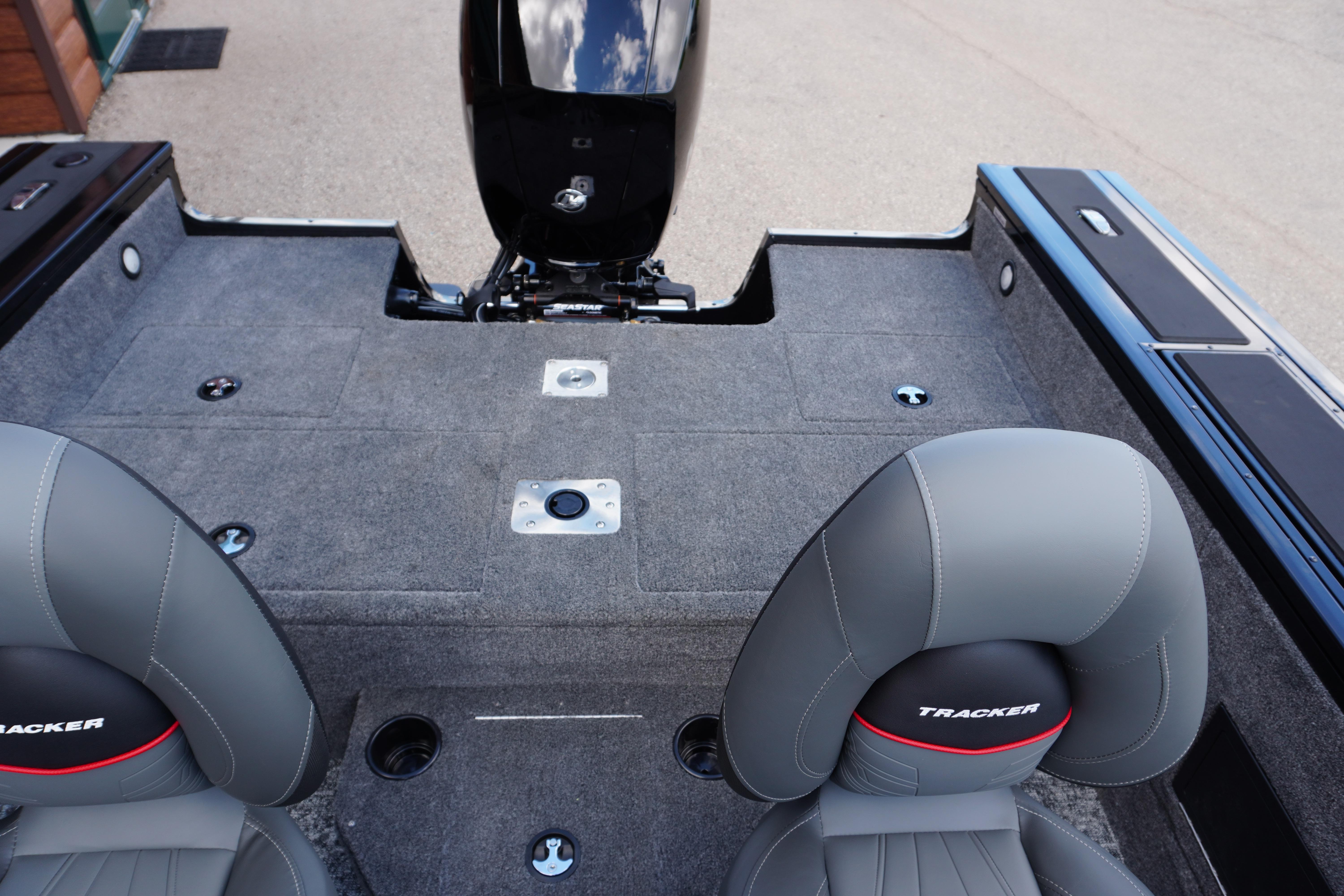 2026 Tracker Targa V-18 WT boat interior with gray seating and carpeted deck.