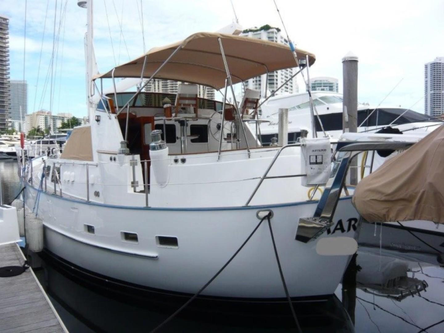 Cheoy Lee-Sloop 1990-Maraya FL-US-1990 Cheoy Lee Sloop docked at marina, featuring a spacious deck and canopy.-9808426 | Thumbnail