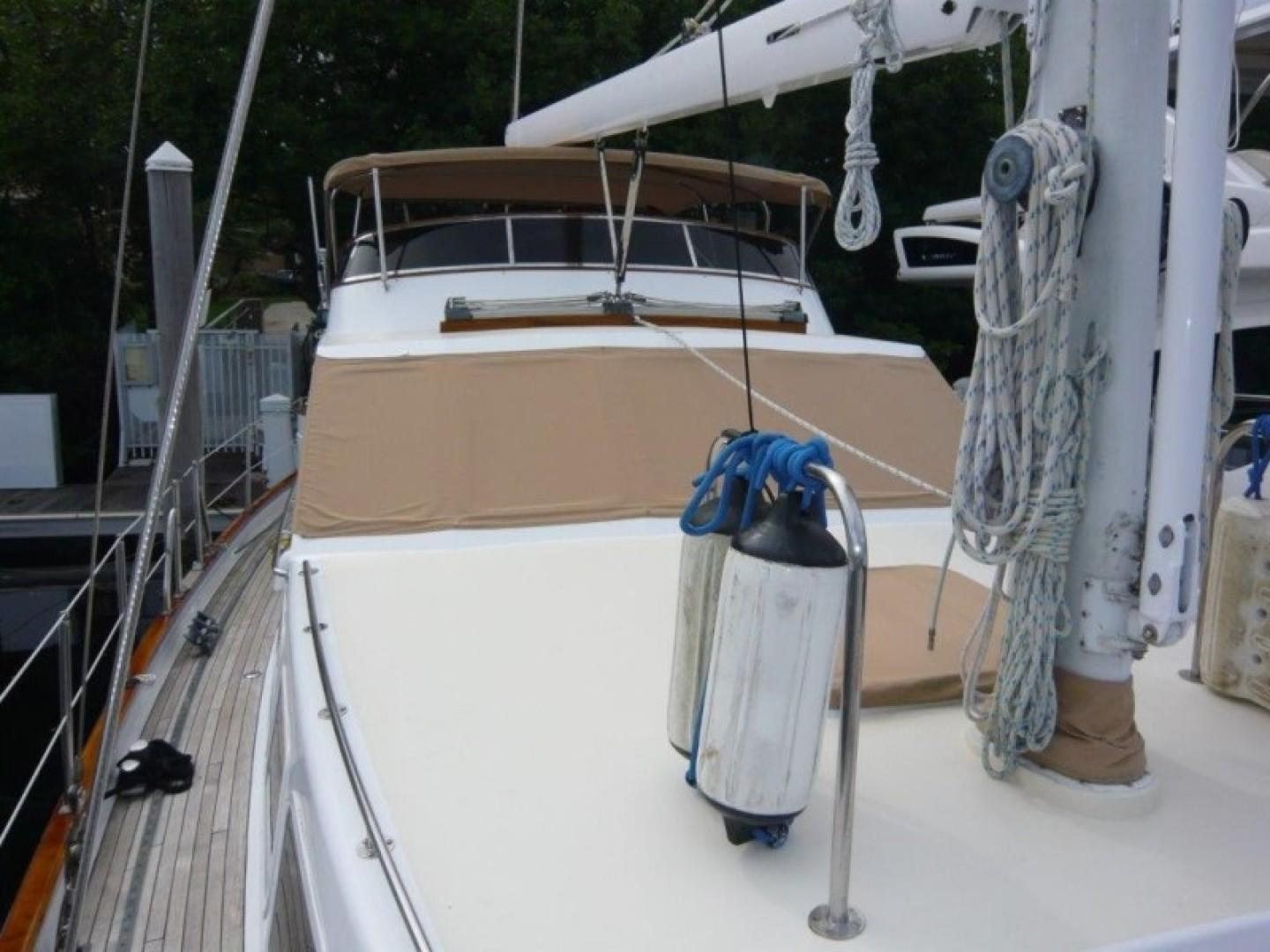 Cheoy Lee-Sloop 1990-Maraya FL-US-1990 Cheoy Lee Sloop with beige deck cover and mooring fenders.-9808426 | Thumbnail