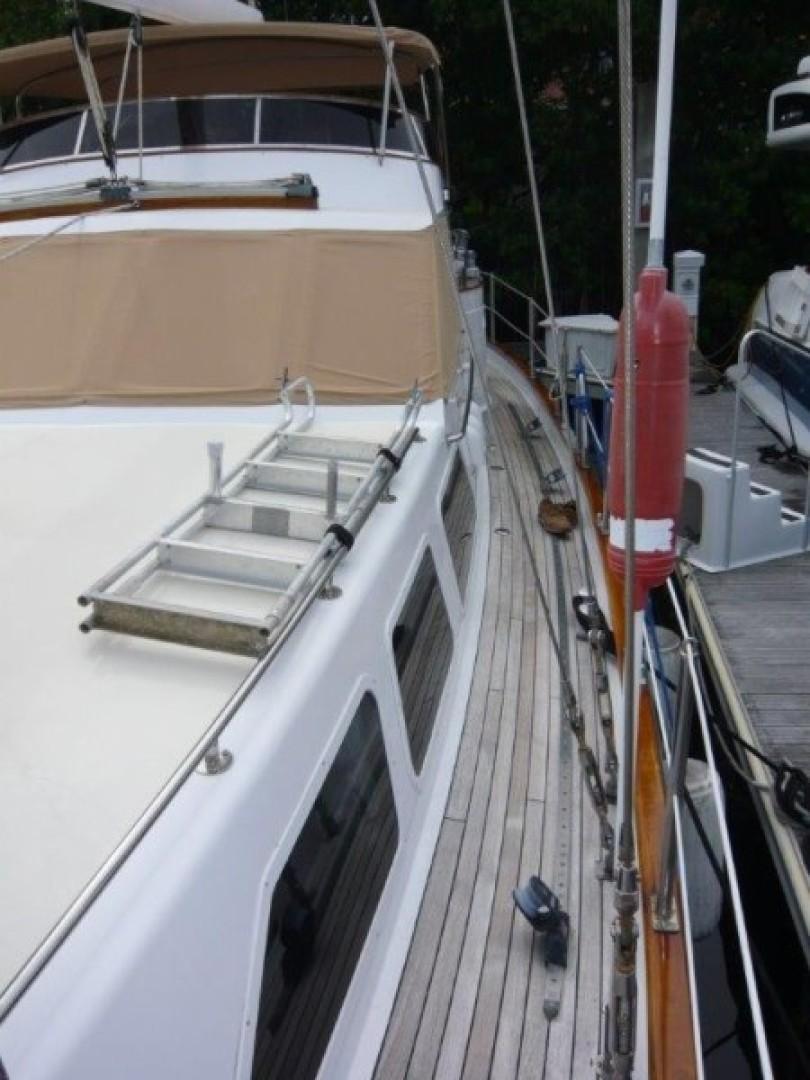 Cheoy Lee-Sloop 1990-Maraya FL-US-1990 Cheoy Lee Sloop with teak deck and beige canopy, docked at marina.-9808426 | Thumbnail