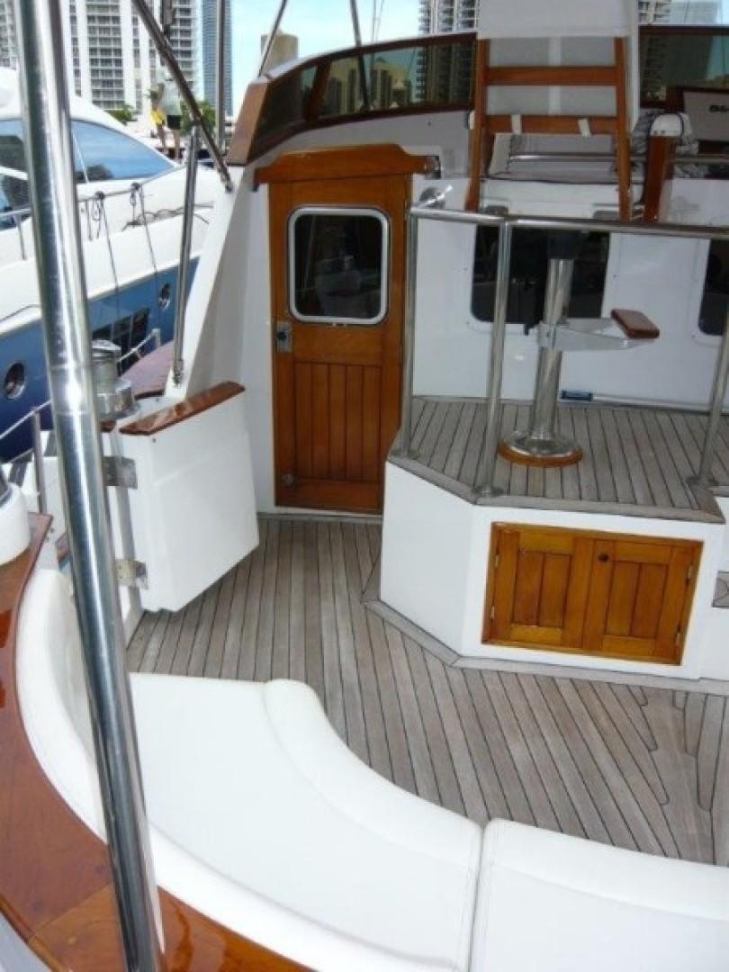 Cheoy Lee-Sloop 1990-Maraya FL-US-1990 Cheoy Lee Sloop interior with wooden accents and seating area.-9808426 | Thumbnail