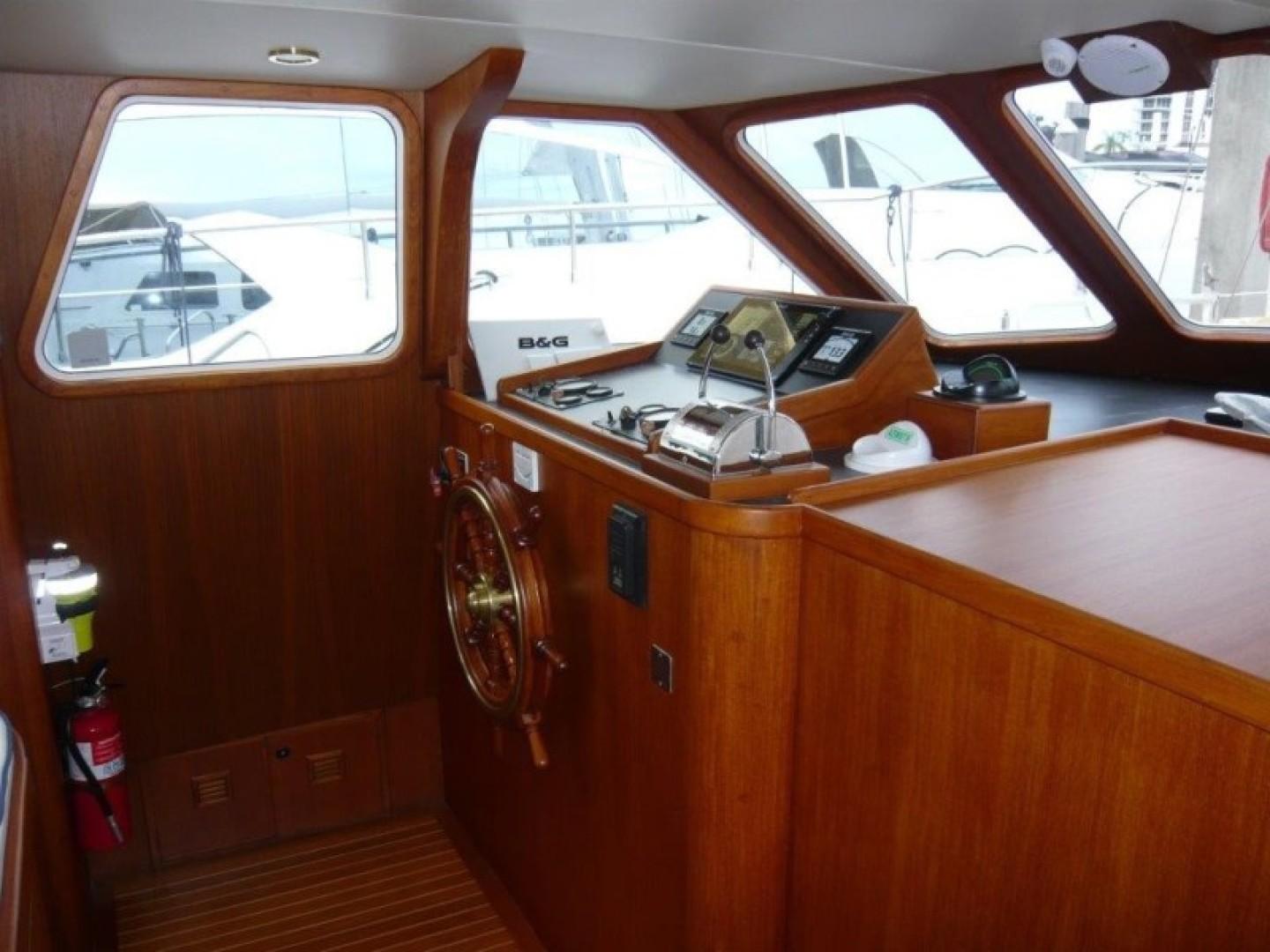 Cheoy Lee-Sloop 1990-Maraya FL-US-1990 Cheoy Lee Sloop interior helm with wooden finish and navigation equipment.-9808426 | Thumbnail