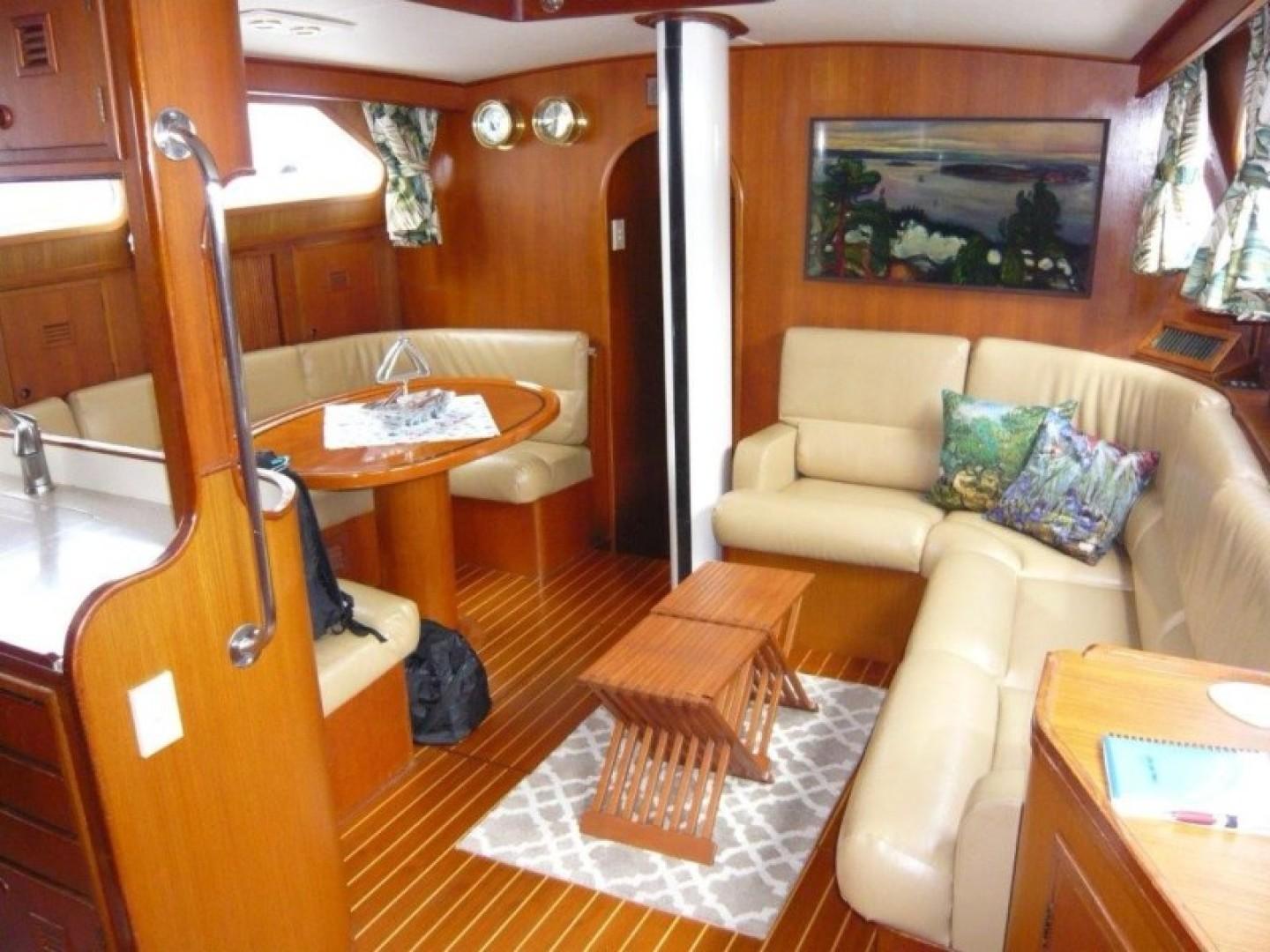 Cheoy Lee-Sloop 1990-Maraya FL-US-Luxurious 1990 Cheoy Lee Sloop interior with wood finish, cozy seating, and nautical decor.-9808426 | Thumbnail