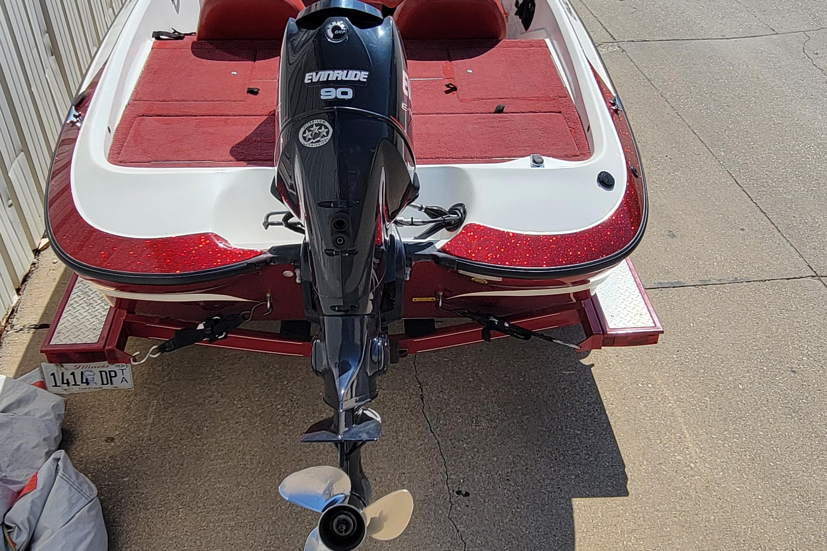 2000 Nitro 640LX boat with Evinrude 90 engine on a trailer.