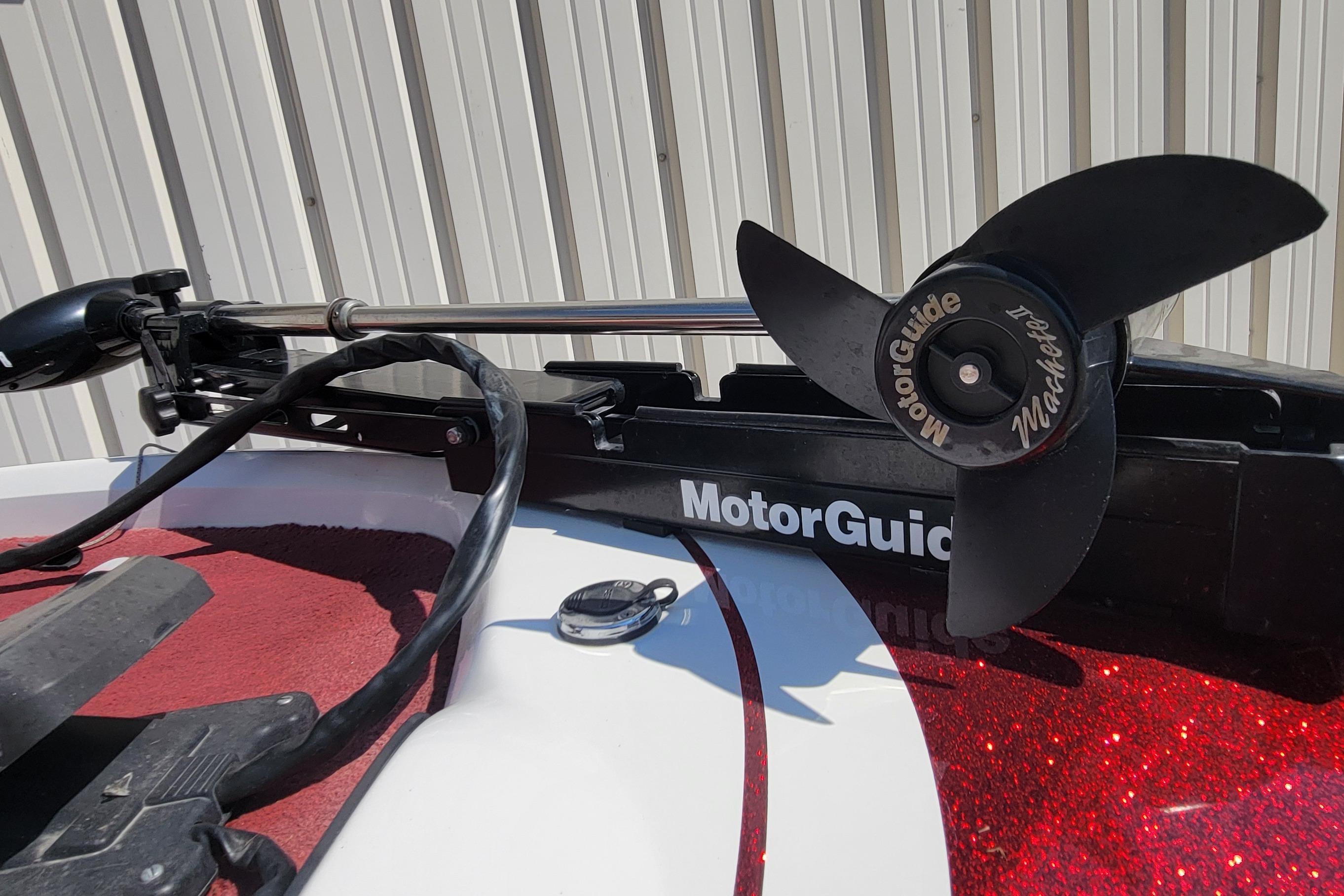 MotorGuide trolling motor on 2000 Nitro 640LX boat, red and white deck.