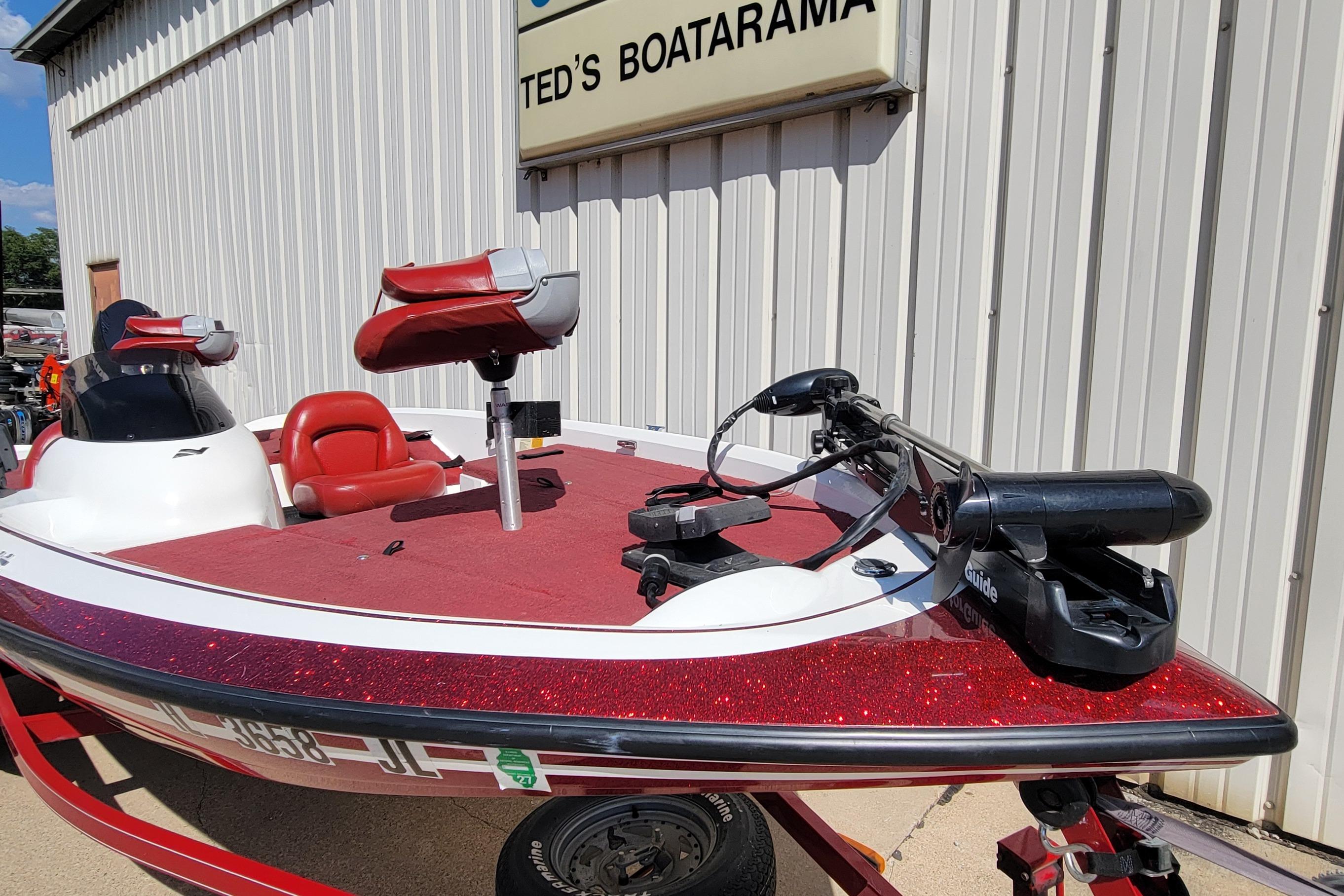 2000 Nitro 640LX boat with red seats and trolling motor at Ted's Boatarama.