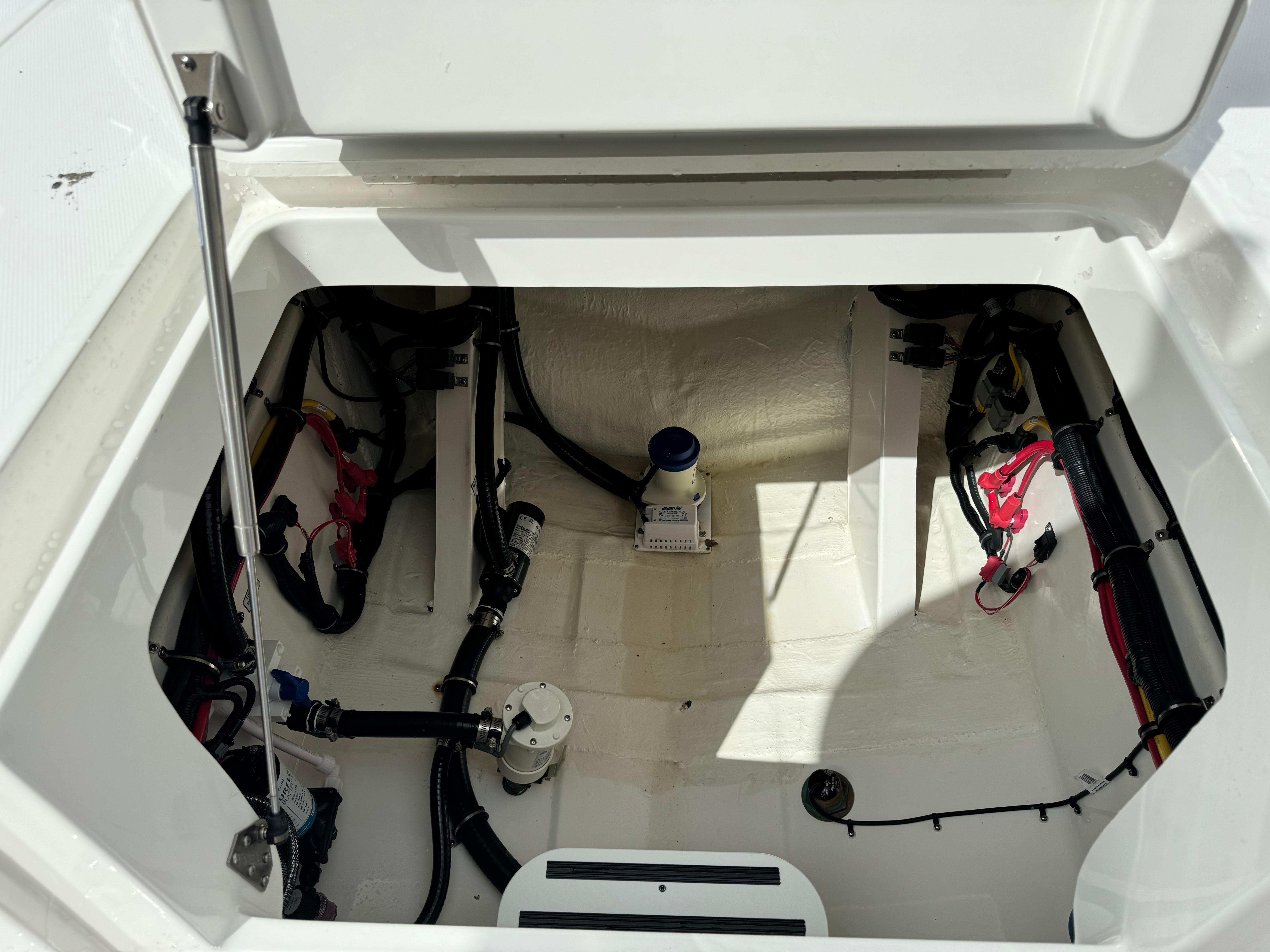 Regulator-30XO 2024-STORM GRAY MA-US-2024 Regulator 30XO boat compartment with visible wiring and components.-9692464 | Thumbnail
