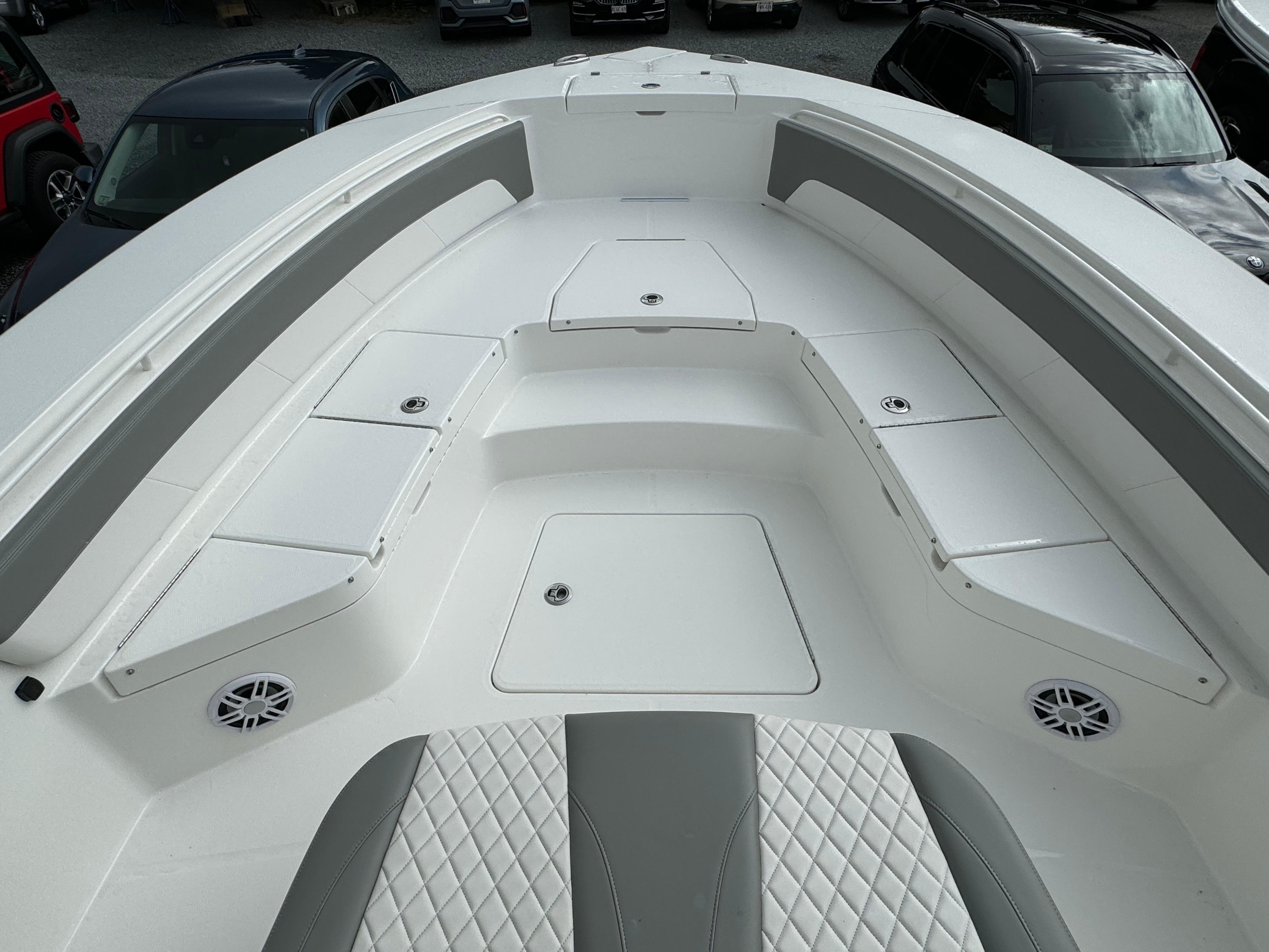Regulator-30XO 2024-STORM GRAY MA-US-2024 Regulator 30XO boat interior with white seating and storage compartments.-9692464 | Thumbnail