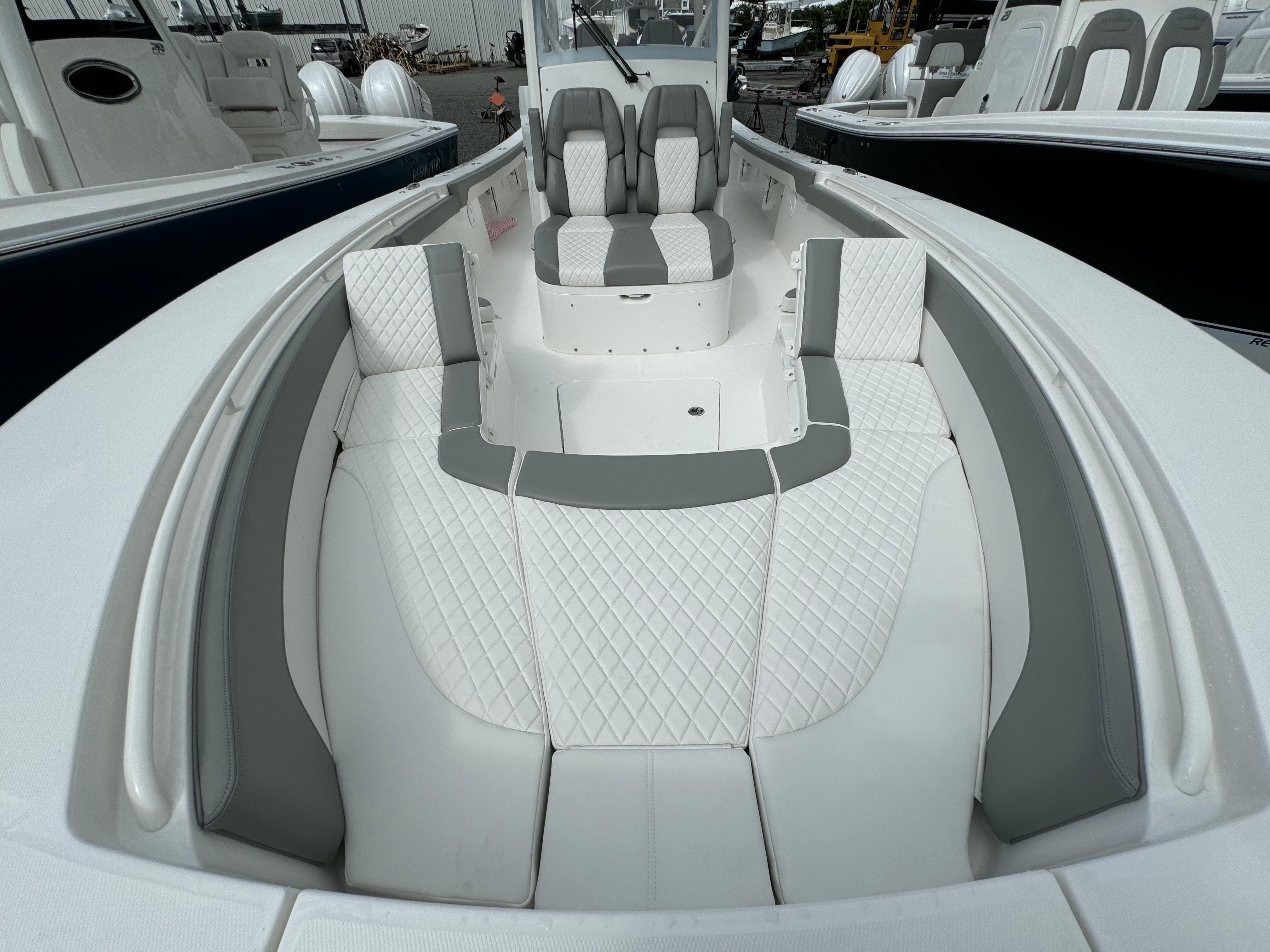 Regulator-30XO 2024-STORM GRAY MA-US-2024 Regulator 30XO boat interior with white and gray cushioned seating.-9692464 | Thumbnail