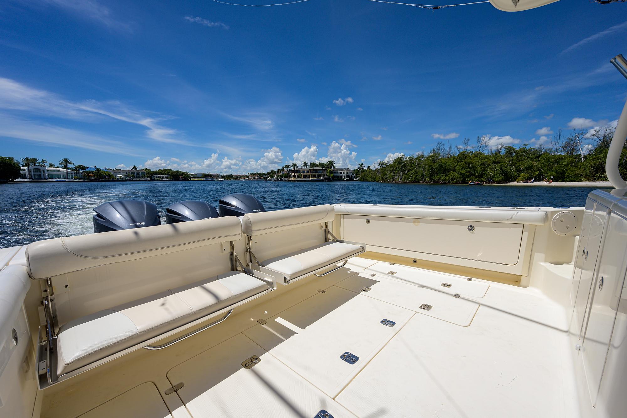 Pursuit 38 Nauti Buoy II -  Exterior starboard aft with engines