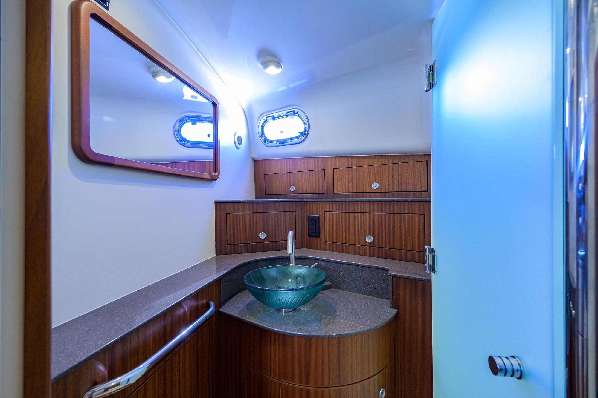 Pursuit 38 Nauti Buoy II - Interior Head with sink and storage
