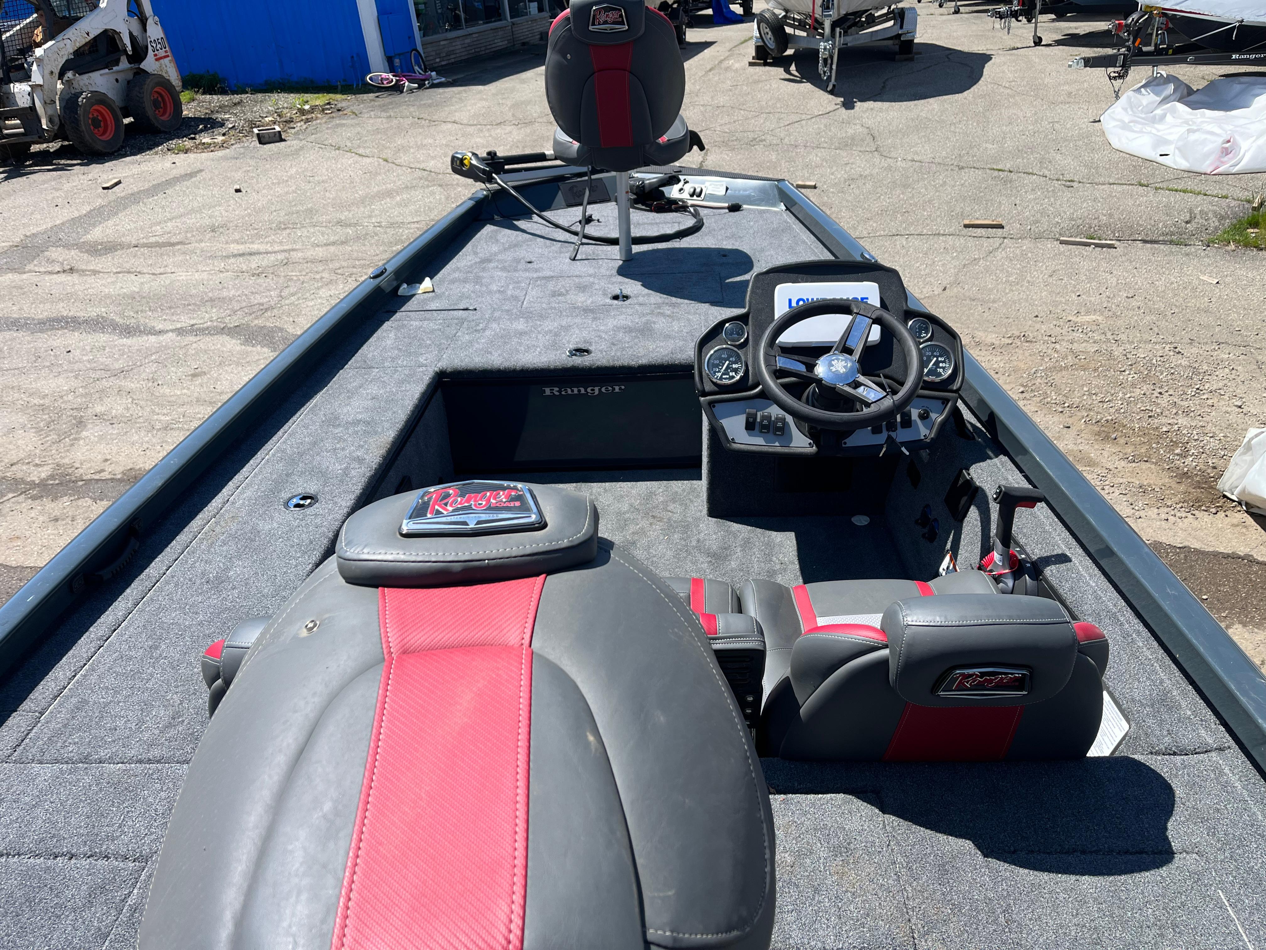 2024 Ranger RT188C fishing boat interior with steering console and seating.