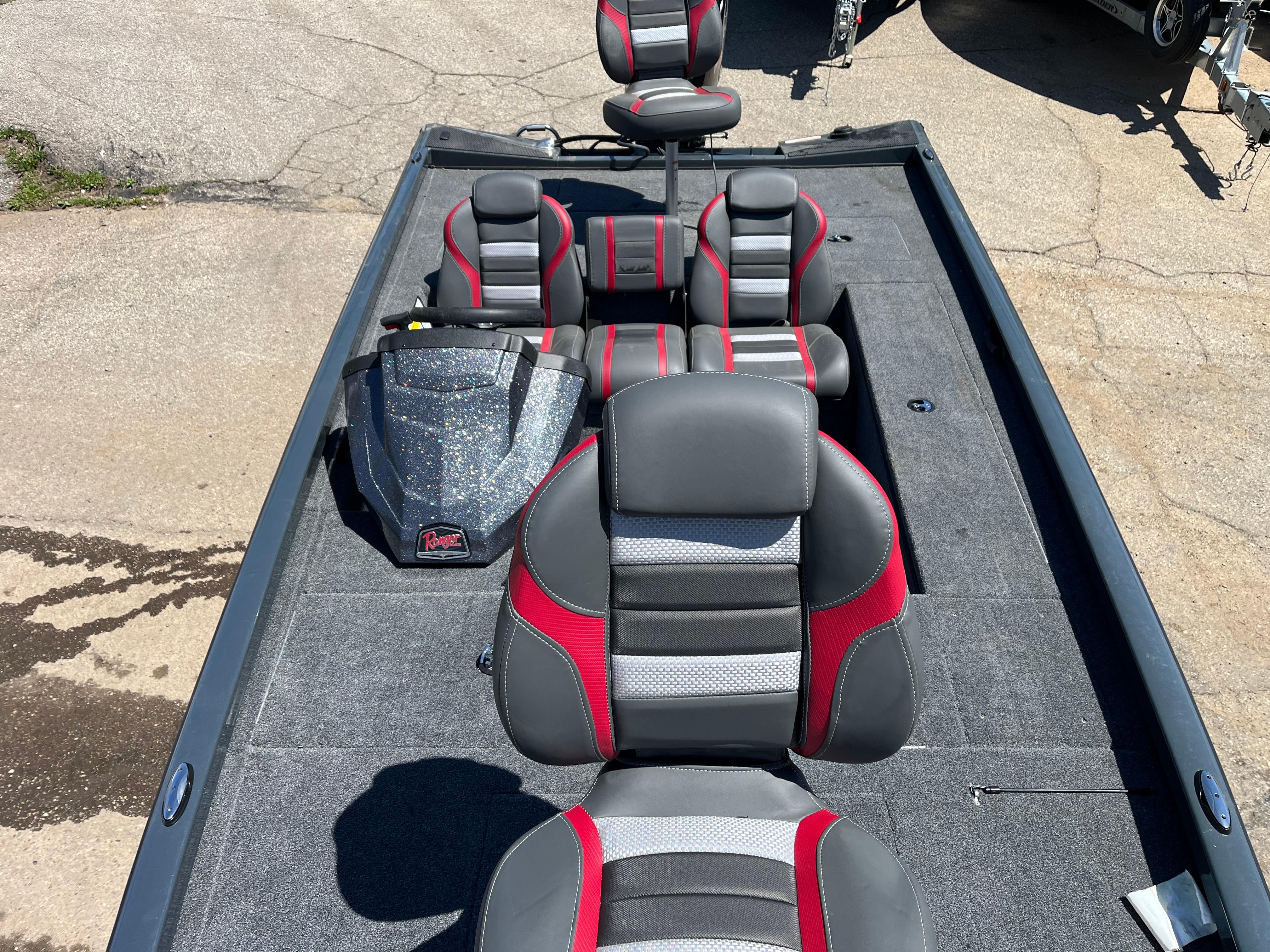 2024 Ranger RT188C boat interior with red and gray seating, viewed from above.