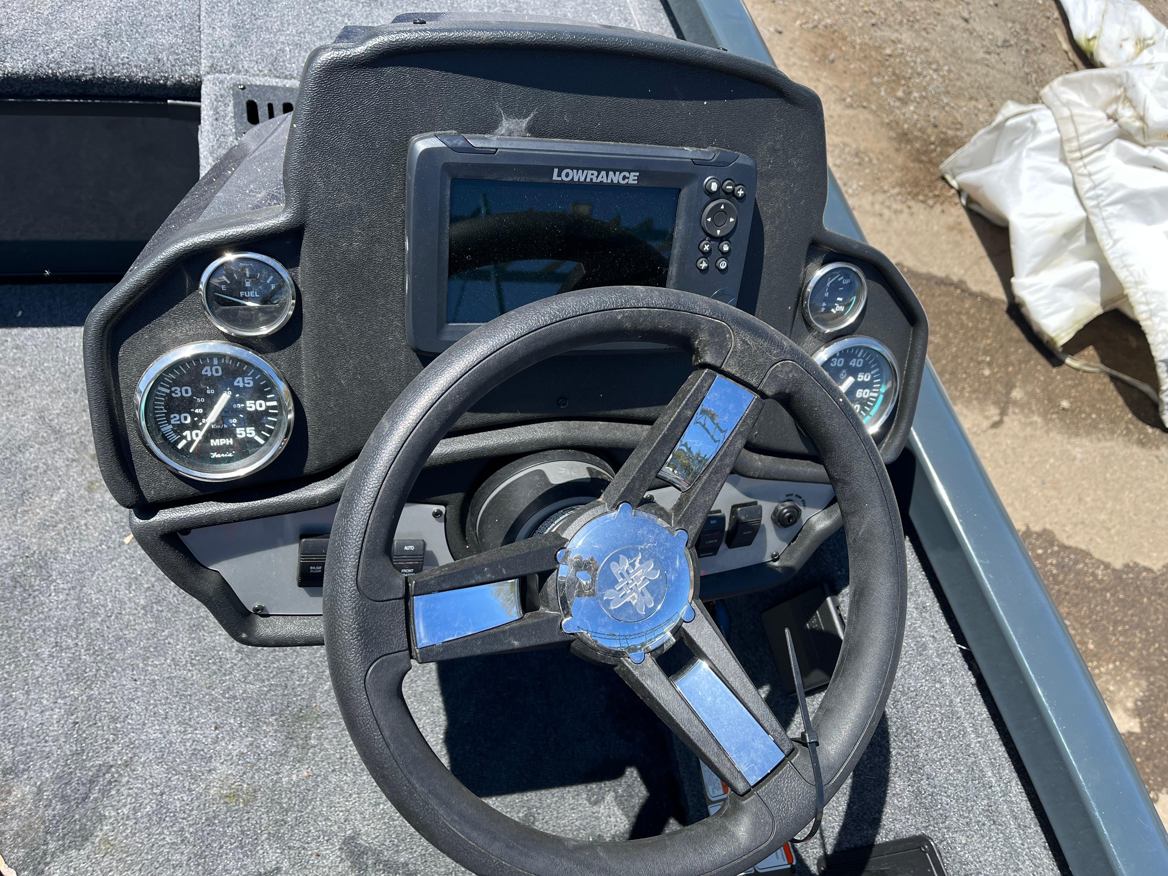 2024 Ranger RT188C boat dashboard with Lowrance display and steering wheel.