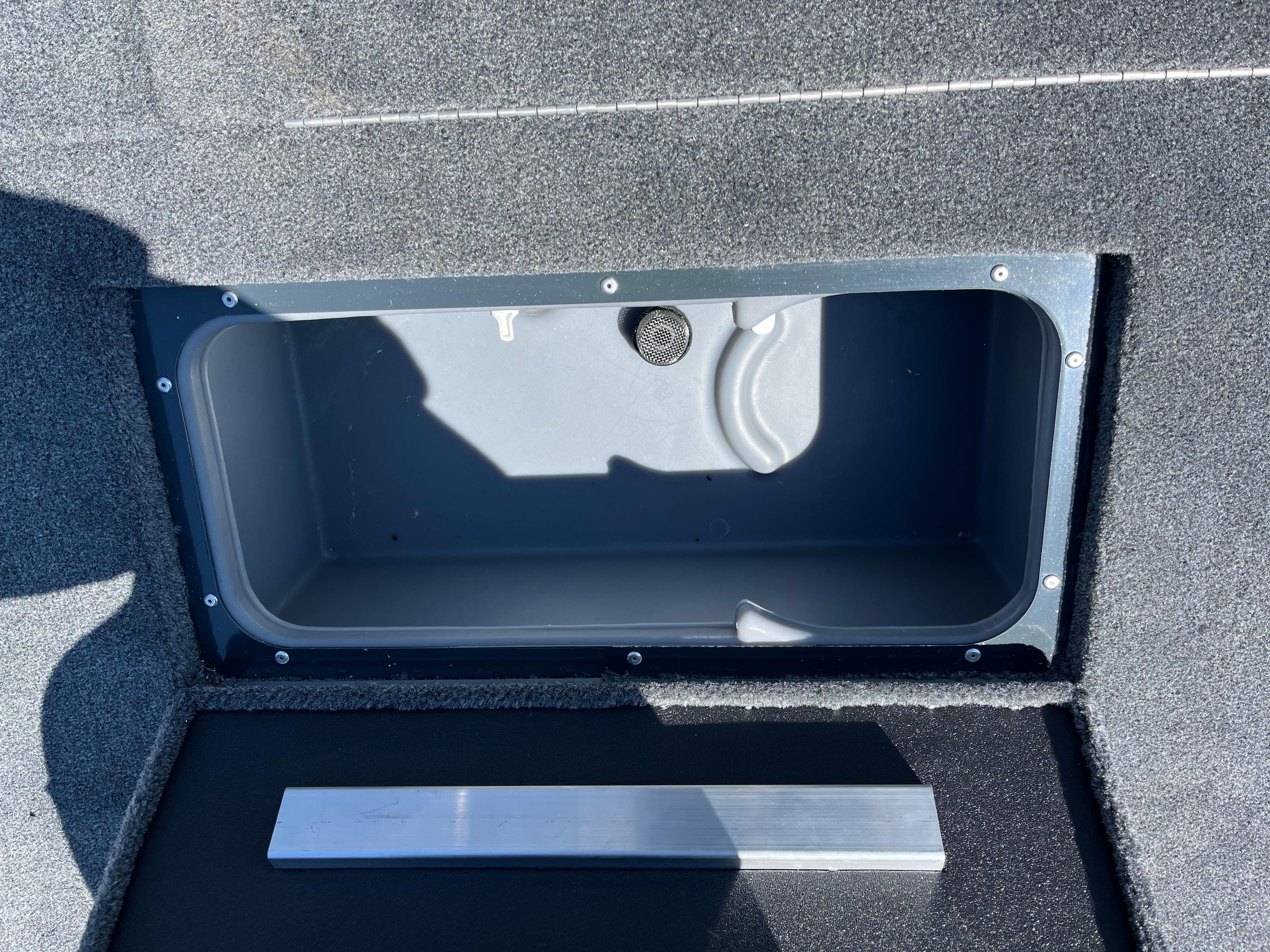 2024 Ranger RT188C storage compartment with open lid, showcasing interior space.