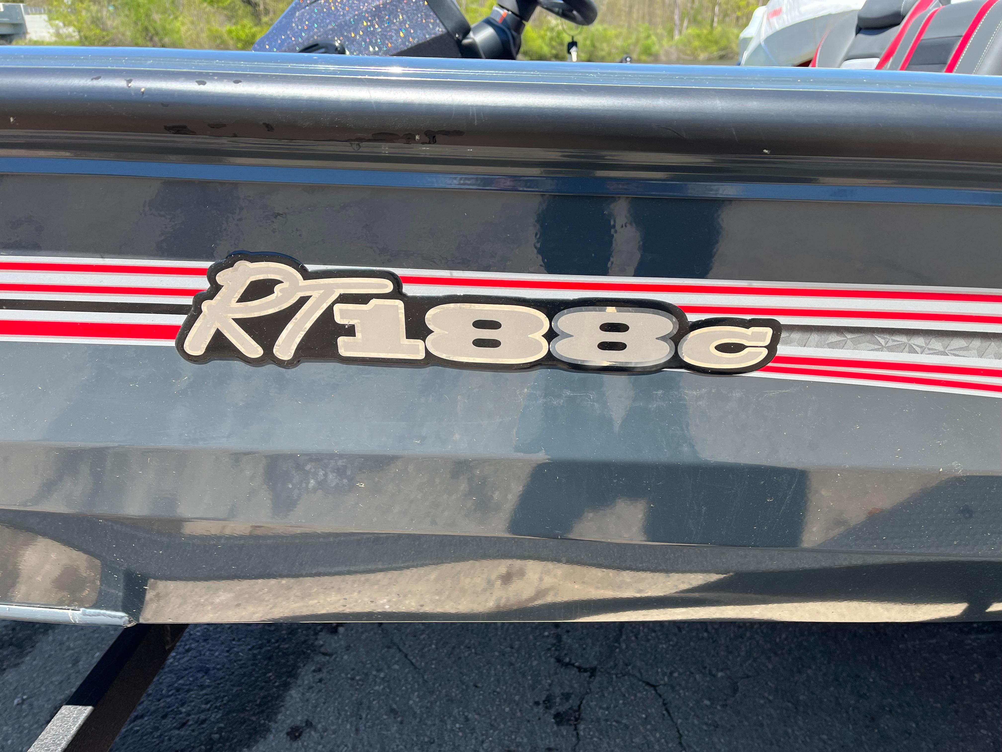 2024 Ranger RT188C boat with red and white stripes on a black hull.