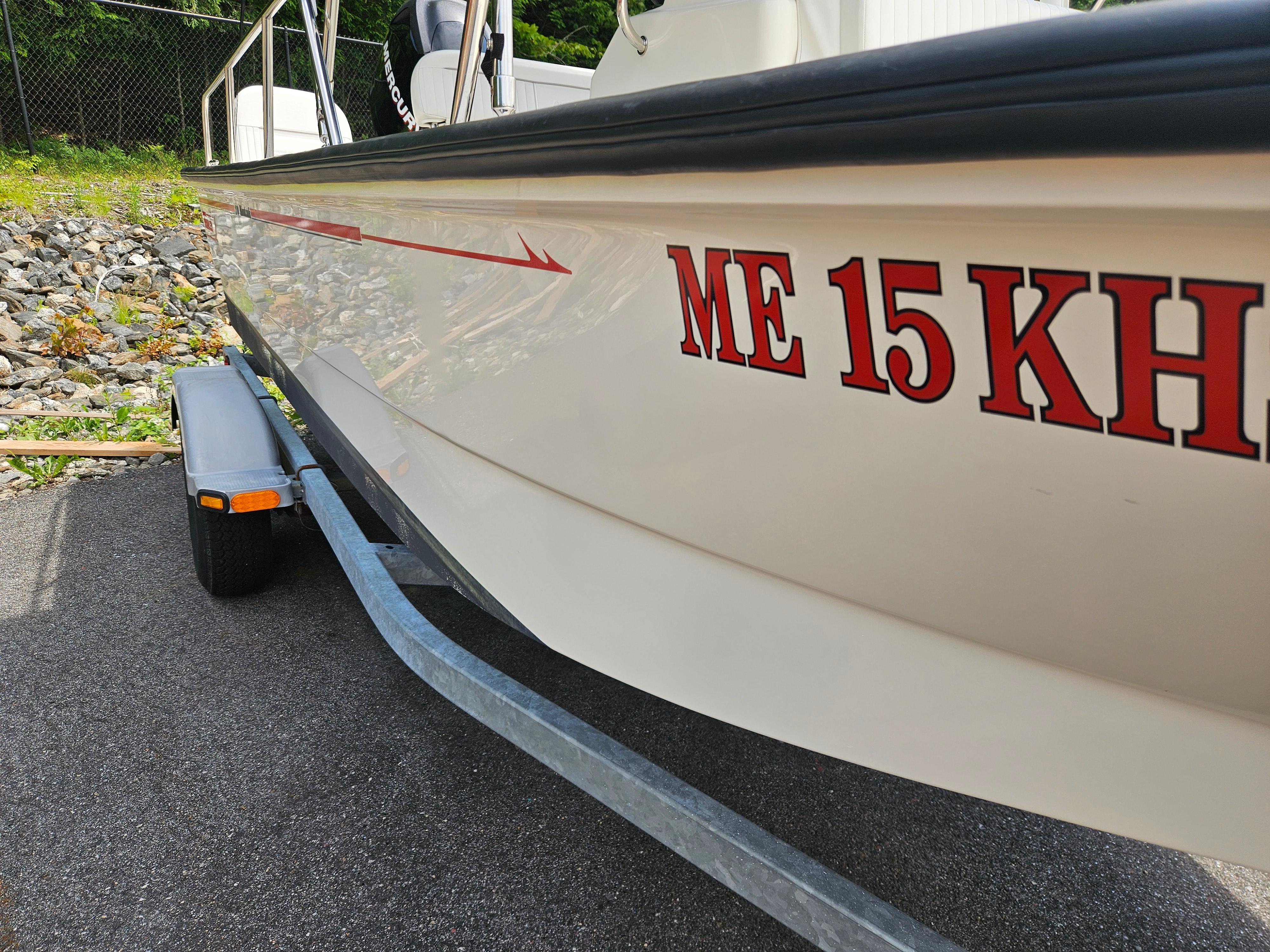 2008 Boston Whaler 170 Montauk on trailer, registration ME 15 KH visible.