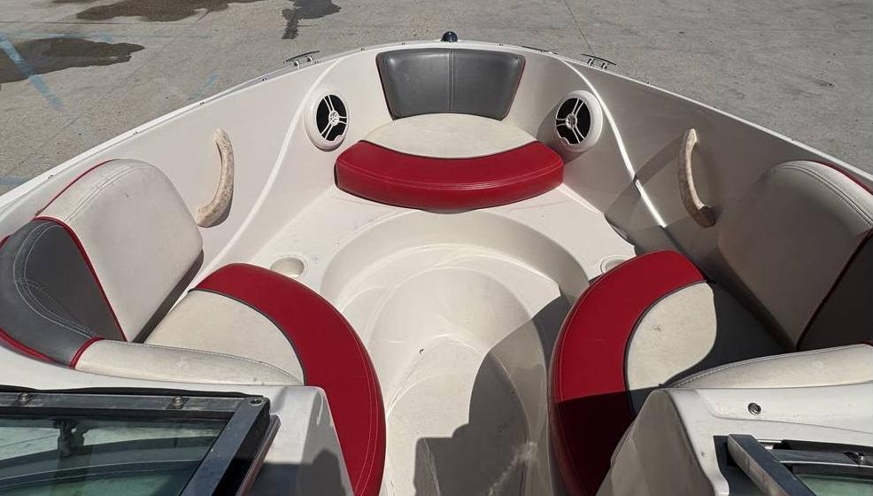 2007 Sea Ray 195 Sport boat interior with red and gray seating.