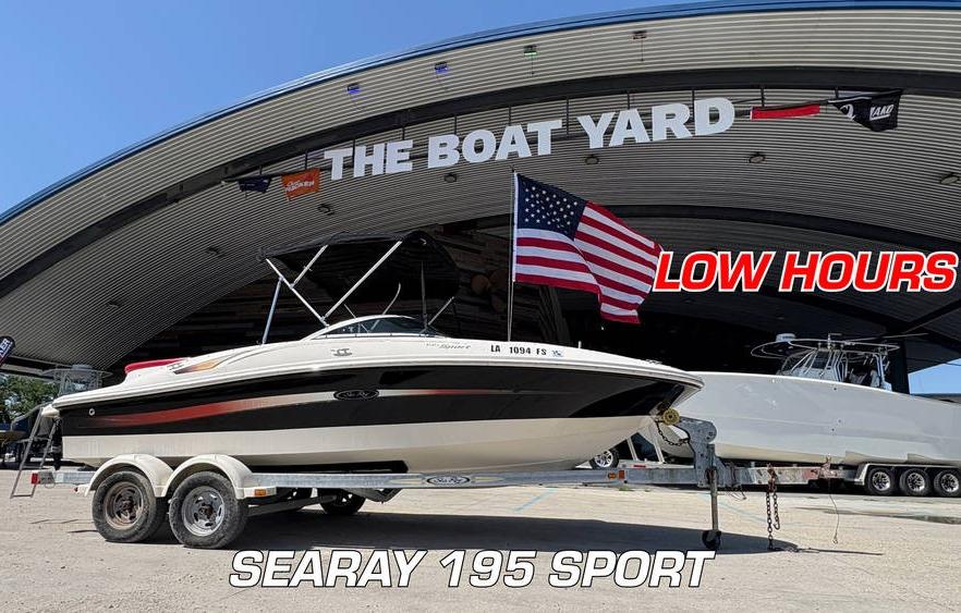 2007 Sea Ray 195 Sport boat at The Boat Yard, low hours, American flag displayed.