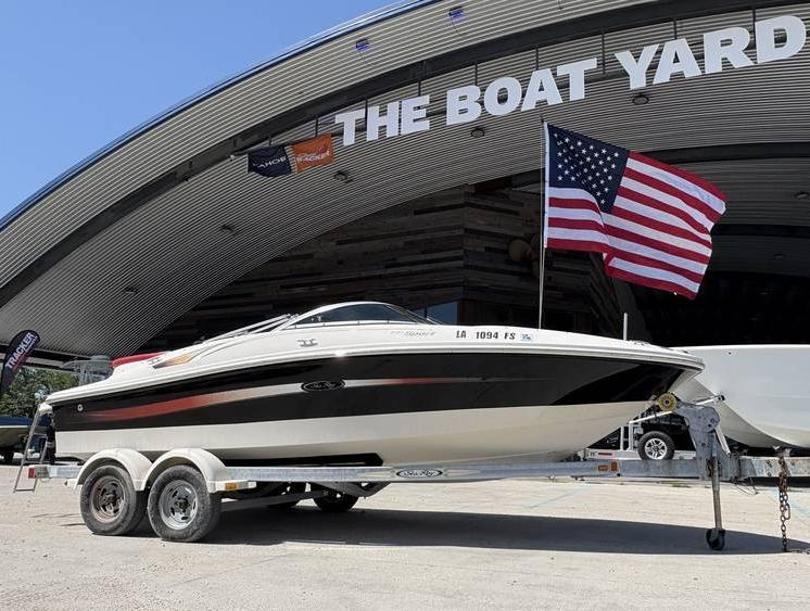 2007 Sea Ray 195 Sport boat on trailer, displayed at The Boat Yard with American flag.