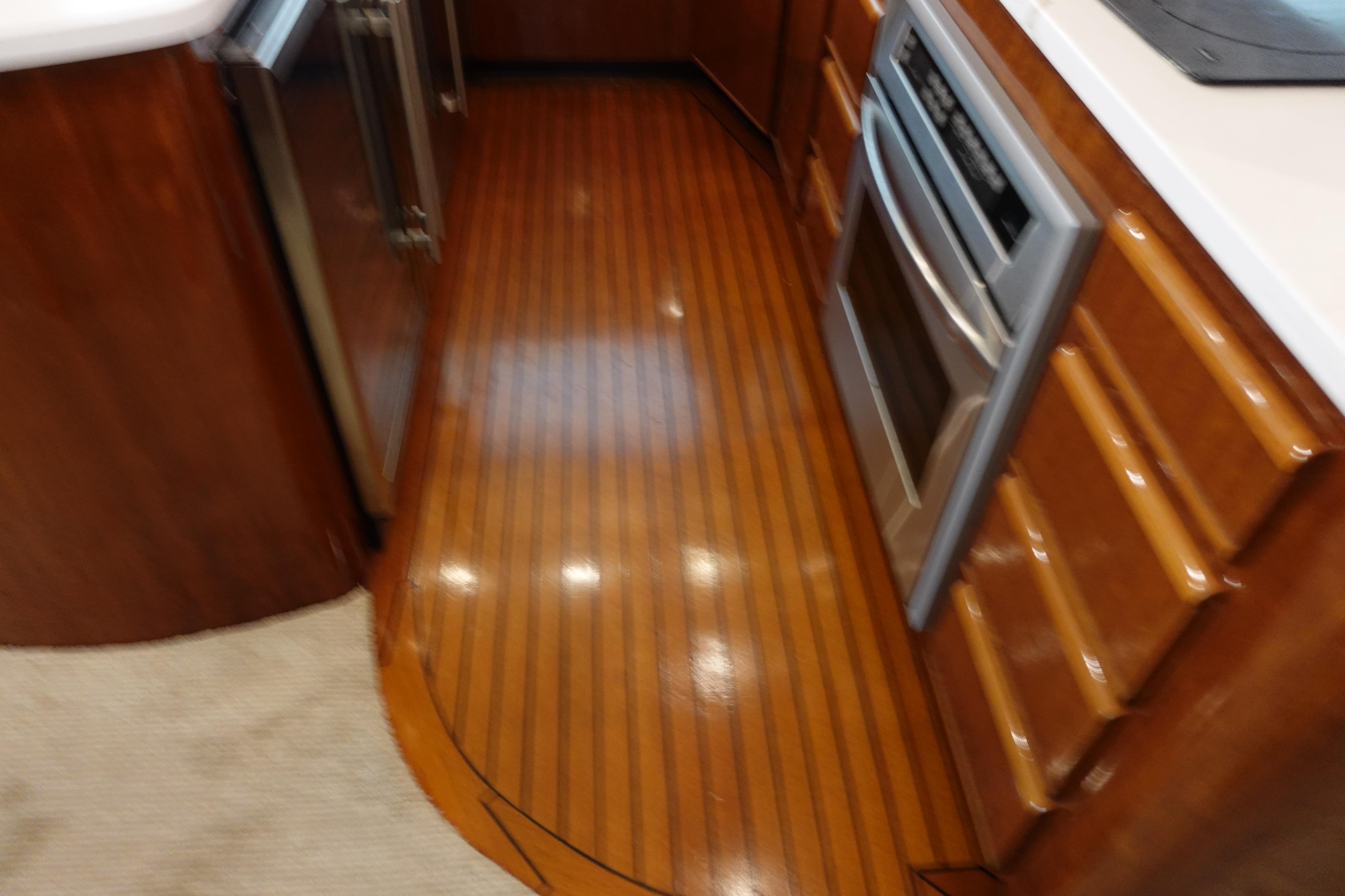 Donzi-Z-65 Tounament Fisherman 1988 -NY-US-1988 Donzi Z-65 Tournament Fisherman yacht kitchen with wood flooring and modern appliances.-9438541 | Thumbnail