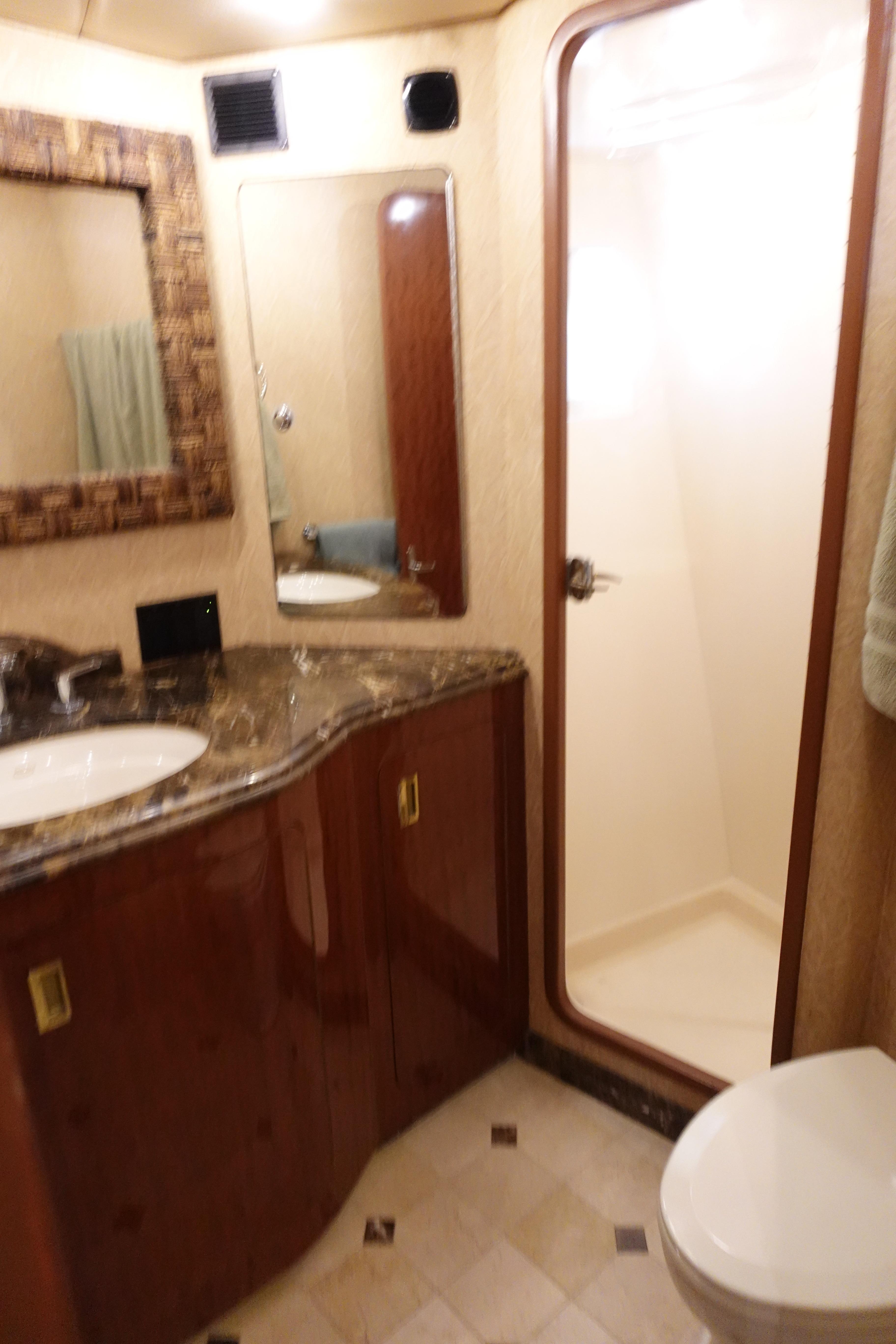 Donzi-Z-65 Tounament Fisherman 1988 -NY-US-1988 Donzi Z-65 Tournament Fisherman yacht bathroom with shower, sink, and toilet.-9438541 | Thumbnail