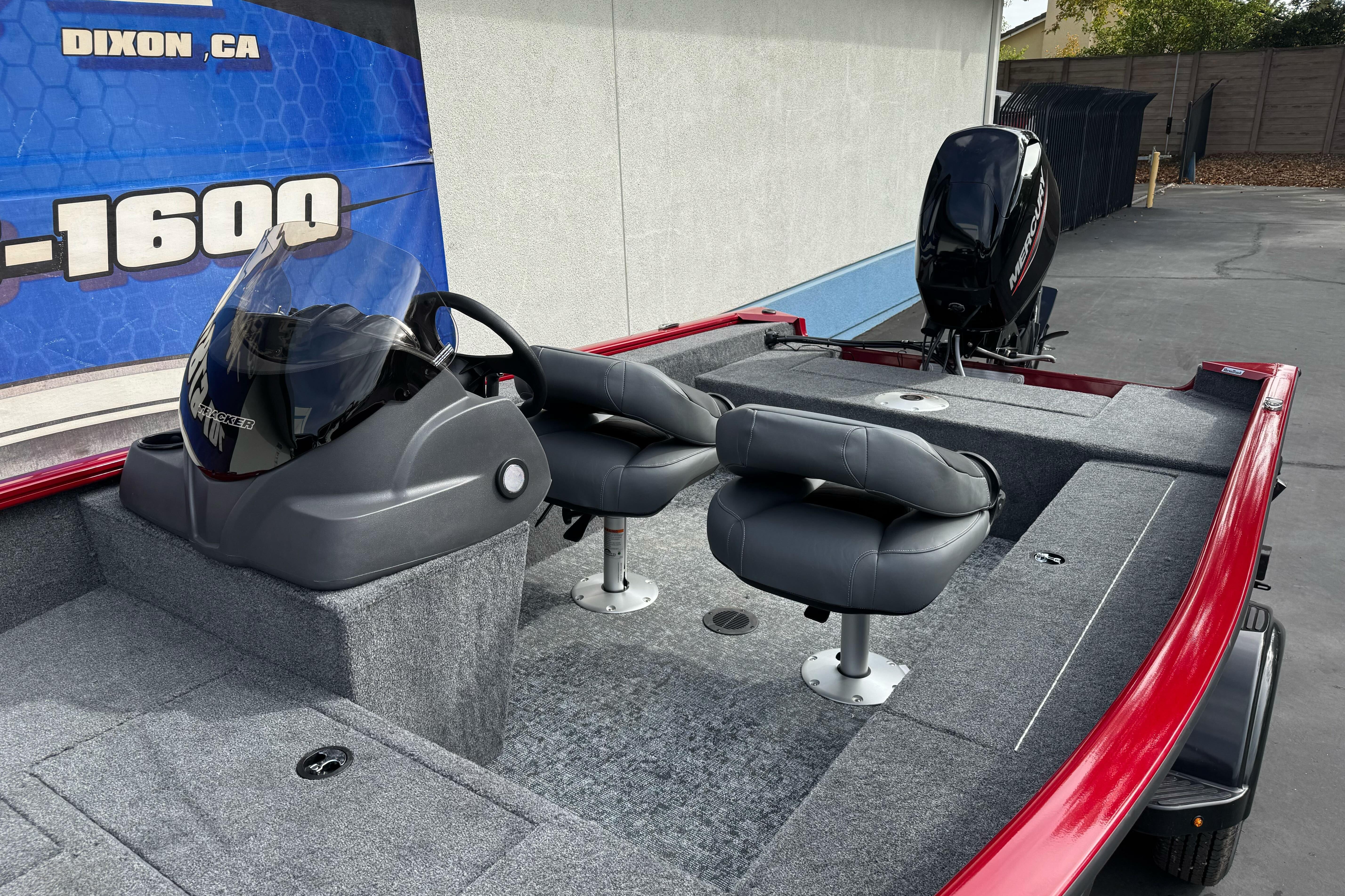 2026 Tracker Super Guide V-16 SC boat with dual seats and Mercury outboard motor.