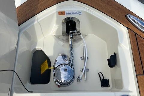 2026 Chris-Craft Sportster 28 anchor compartment with chain and winch system.