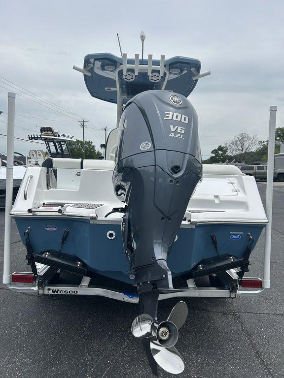 2025 Tidewater 232 LXF boat with powerful 300 V6 engine, rear view.