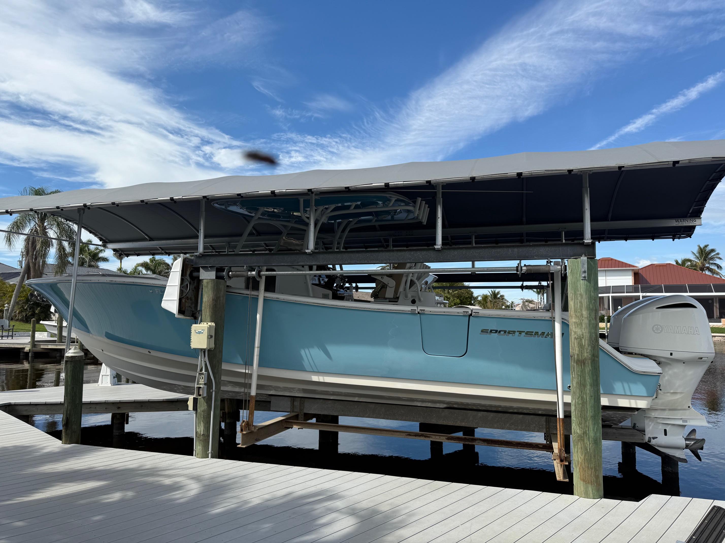 2018-sportsman-312-open---island-blue-lift-kept-and-loaded-power-9808598-20250523170937254-1_XLARGE