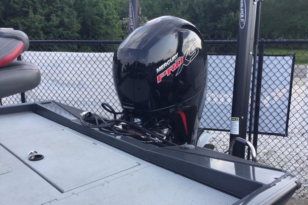 2021 Ranger RT198P boat with Mercury Pro XS engine, parked near a fence.