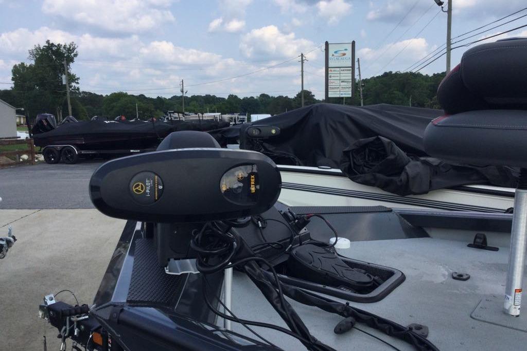 2021 Ranger RT198P boat with trolling motor in a parking lot setting.