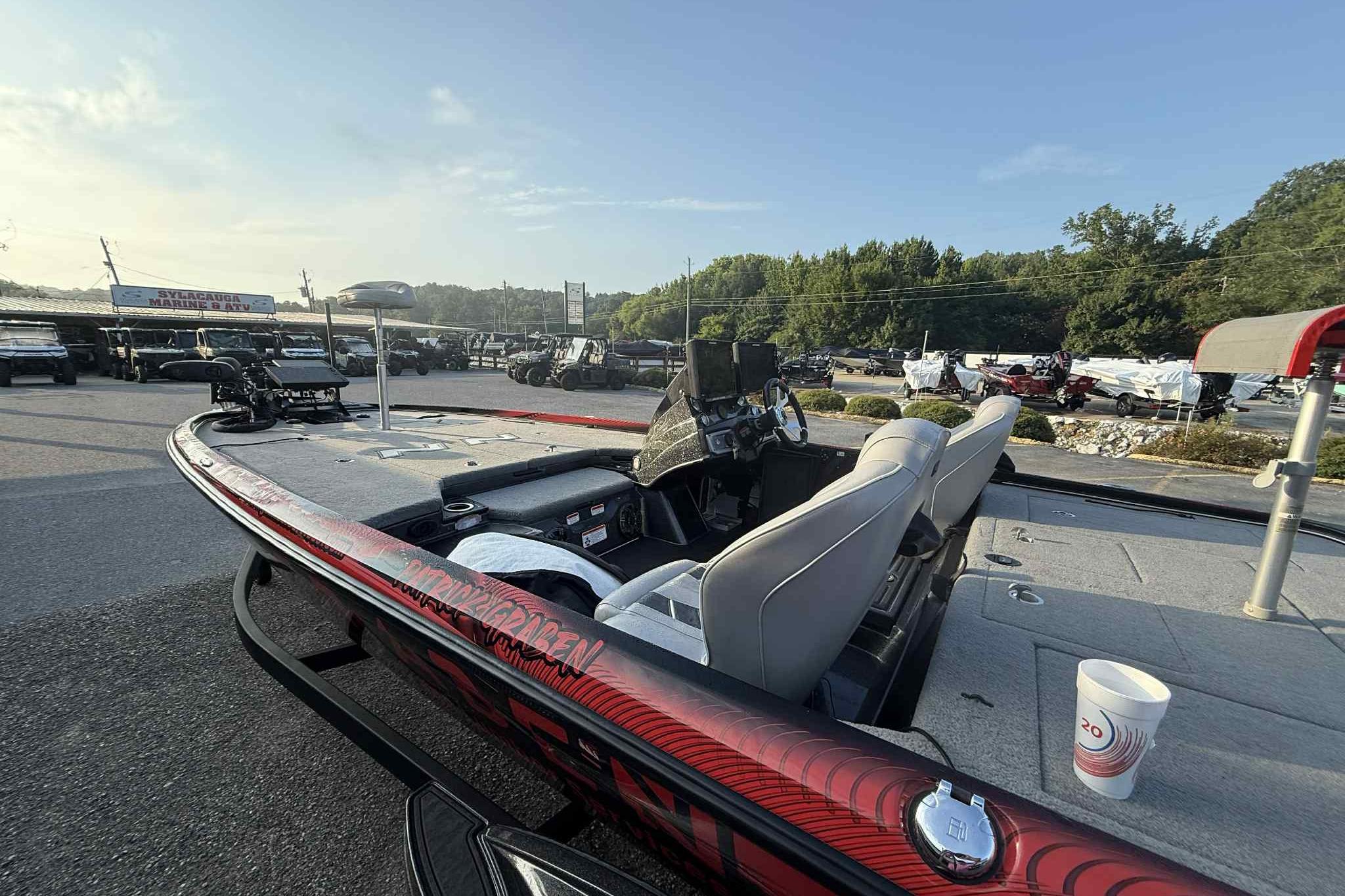 2022 Nitro Z21 XL Pro boat with dual seats, parked outdoors at a dealership.