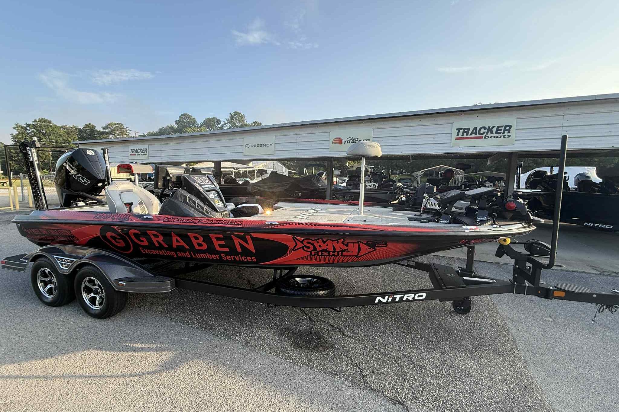 2022 Nitro Z21 XL Pro boat with Graben branding, parked at Tracker Boats dealership.
