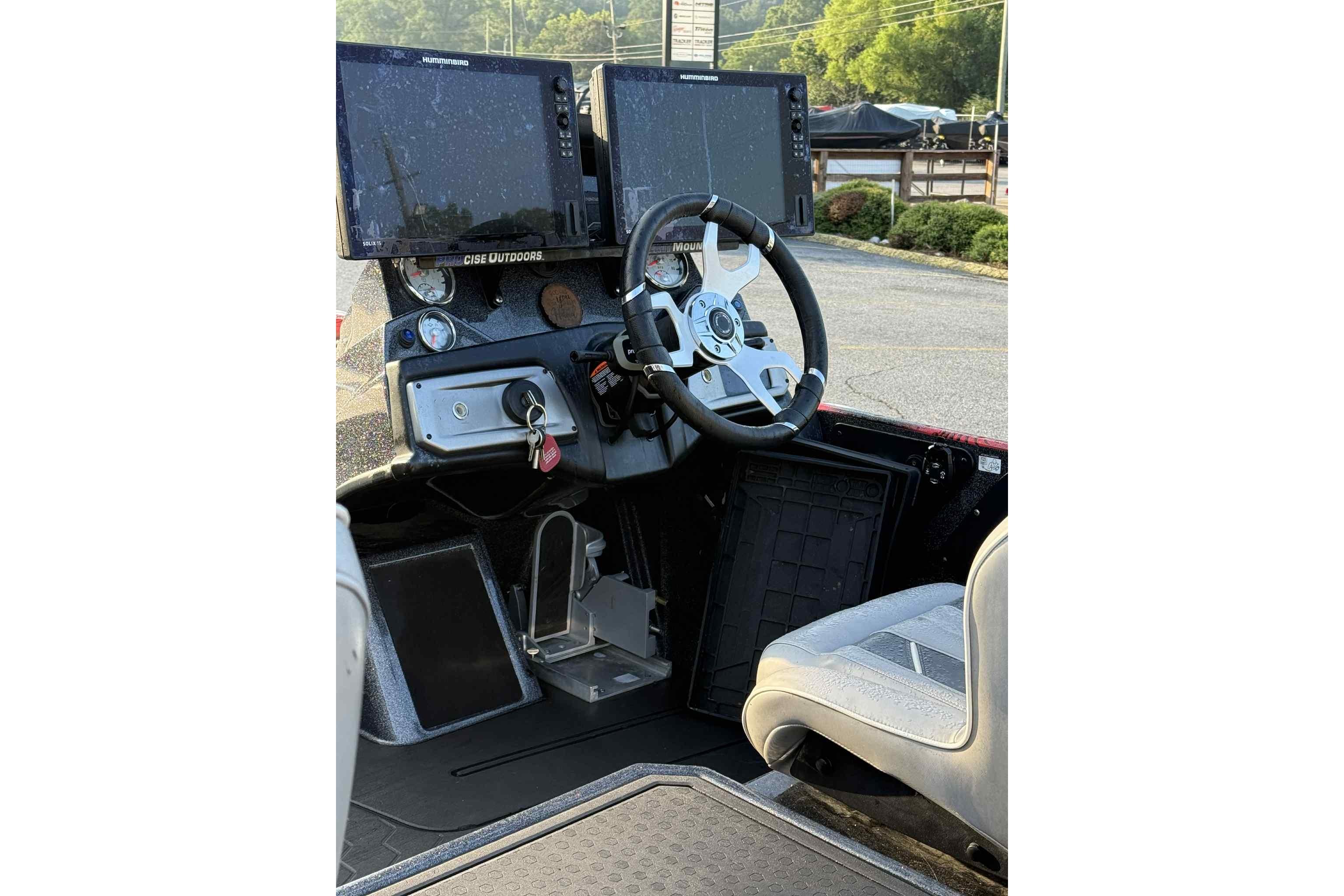 2022 Nitro Z21 XL Pro boat cockpit with dual monitors and steering wheel.