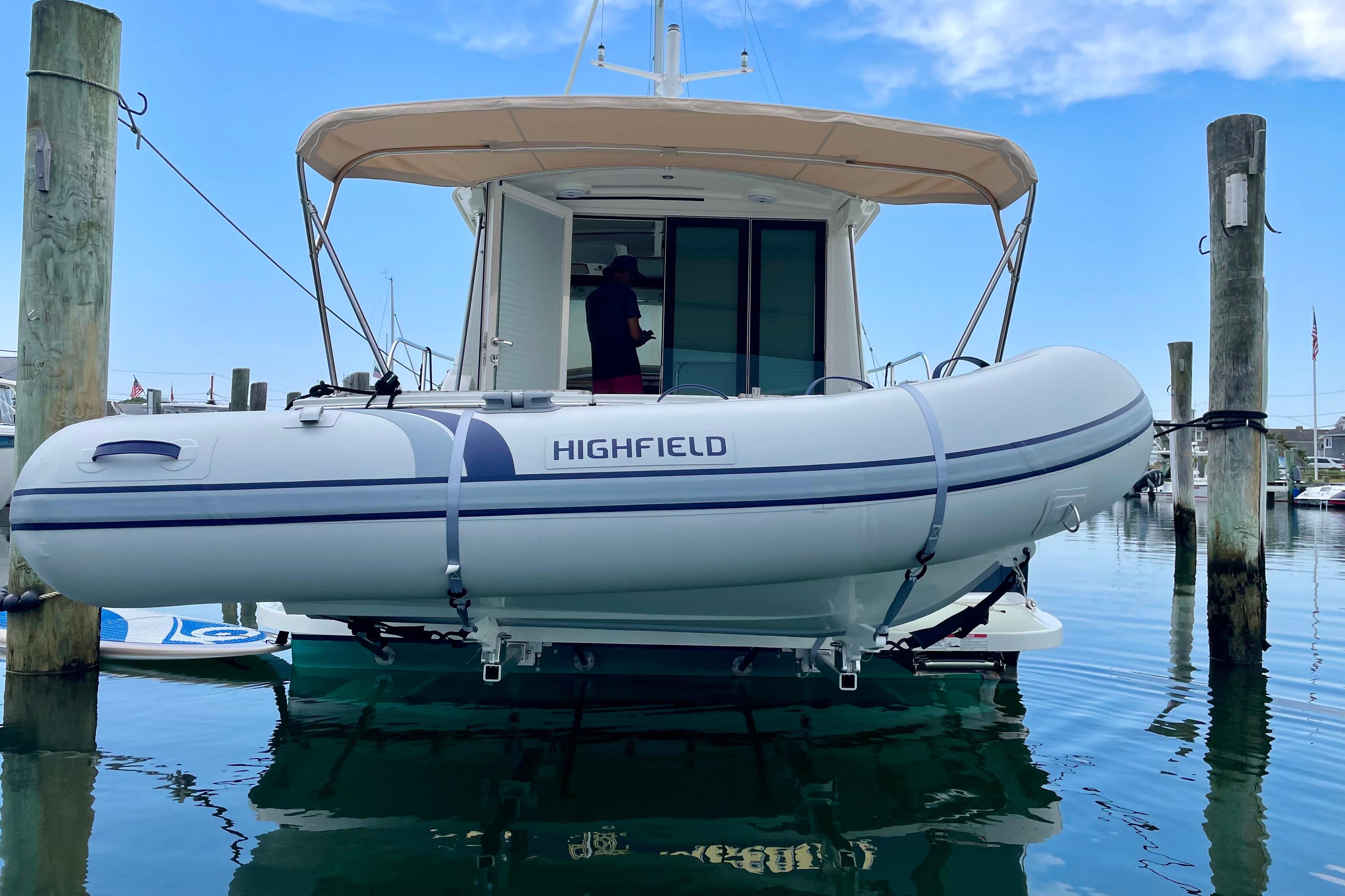 2019 Back Cove 37 with Highfield dinghy docked at marina.