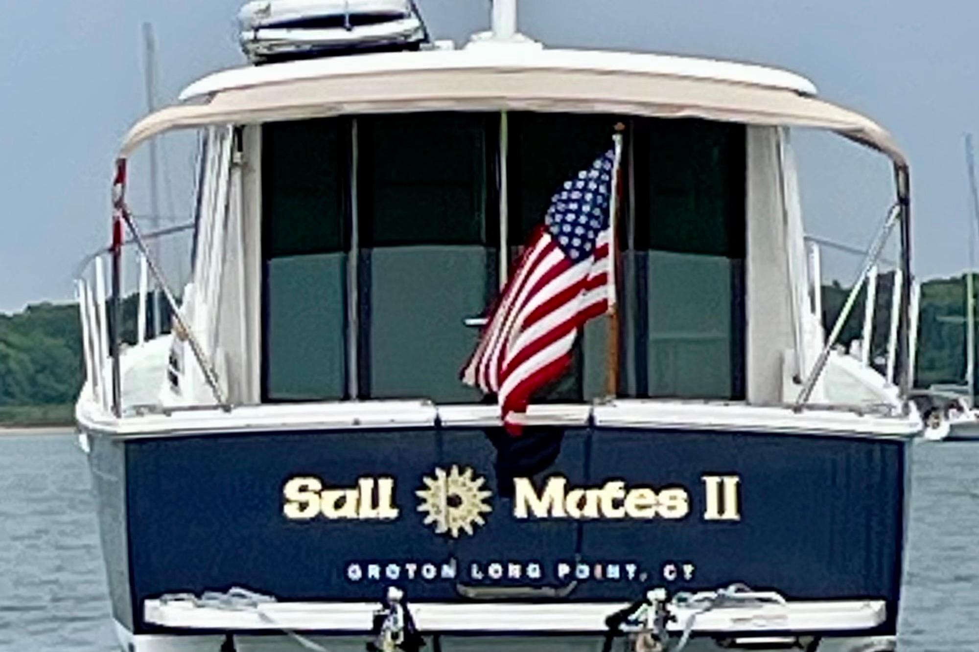 Back Cove 37 boat, 2019 model, named u0022Sail Mates IIu0022 with American flag, Groton Long Point, CT.
