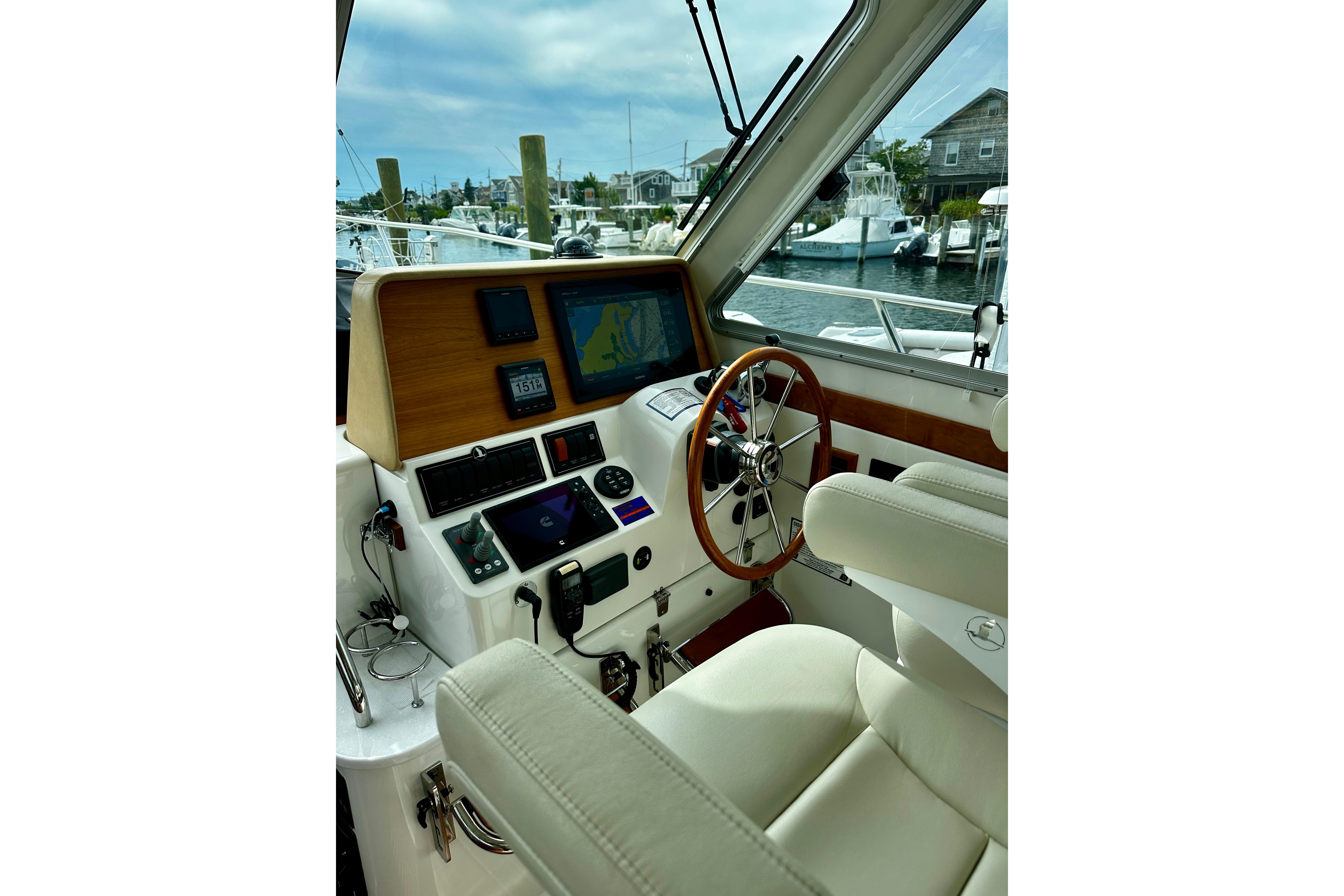 2019 Back Cove 37 helm with modern navigation equipment and comfortable seating.