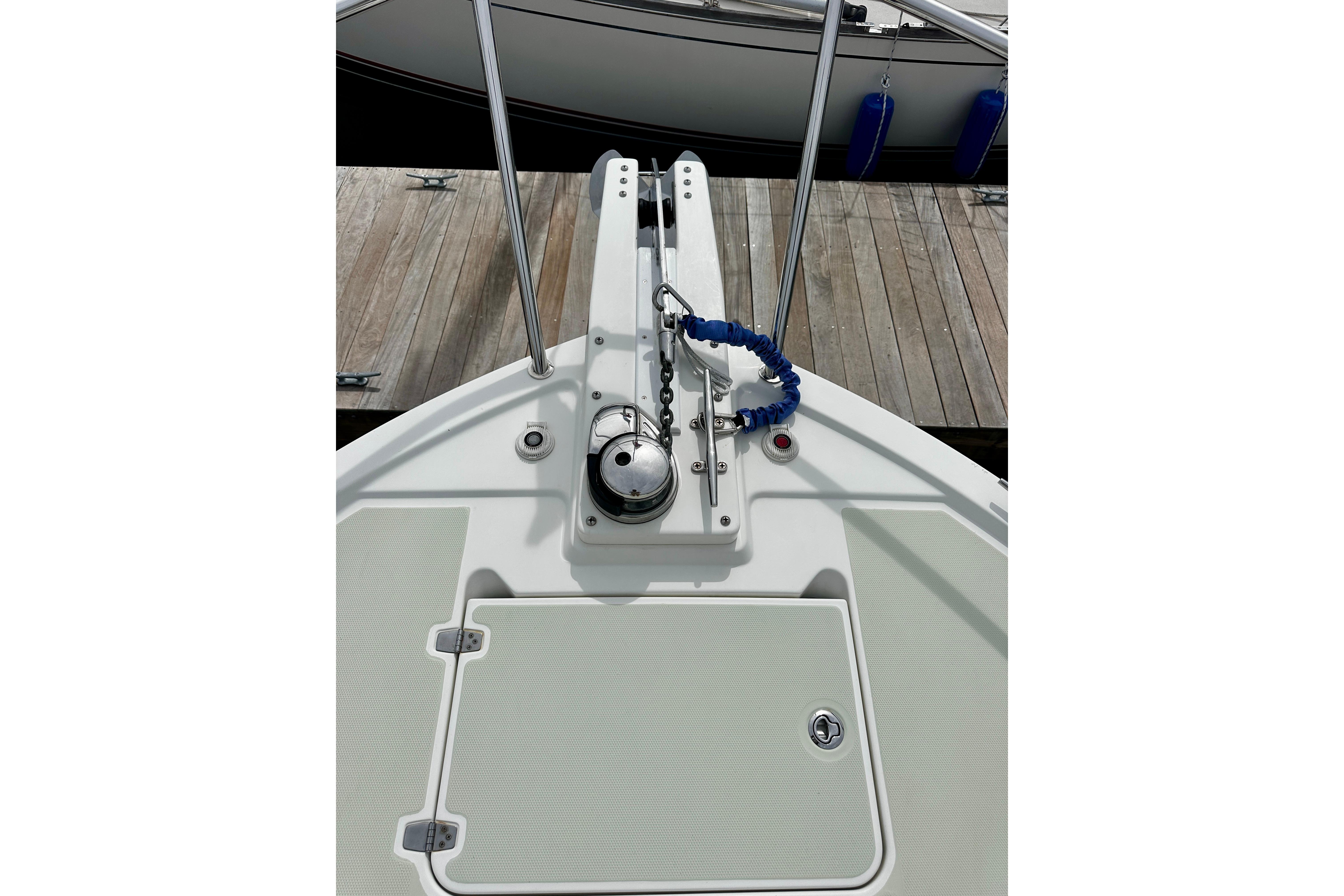 Bow of 2019 Back Cove 37 boat with anchor and deck details.