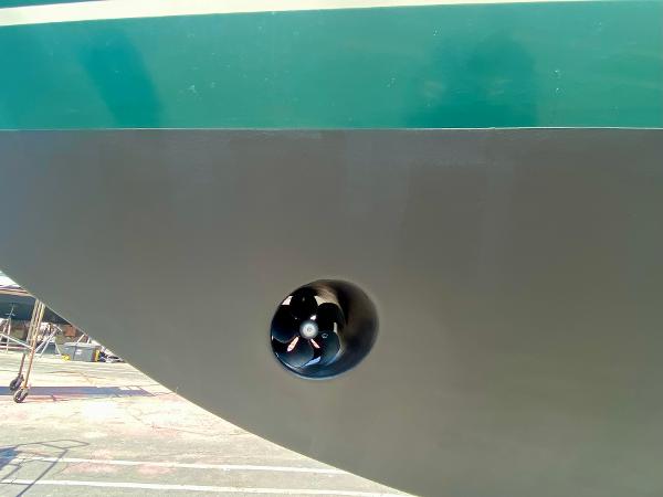 Hull of 1999 Pacific Seacraft 40 Voyagemaker with visible bow thruster.