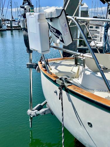 1999 Pacific Seacraft 40 Voyagemaker docked, featuring a clean deck and safety equipment.