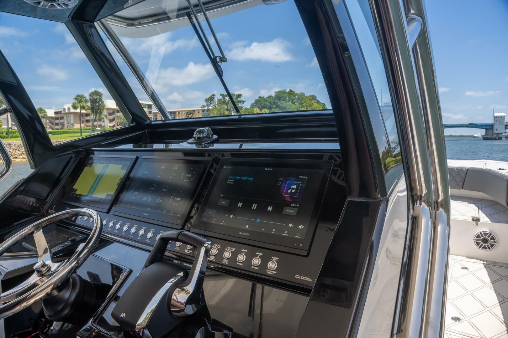 Sedna-37 Open 2025 -FL-US-Helm of 2025 Sedna 37 Open boat with advanced navigation displays.-9788651 | Thumbnail