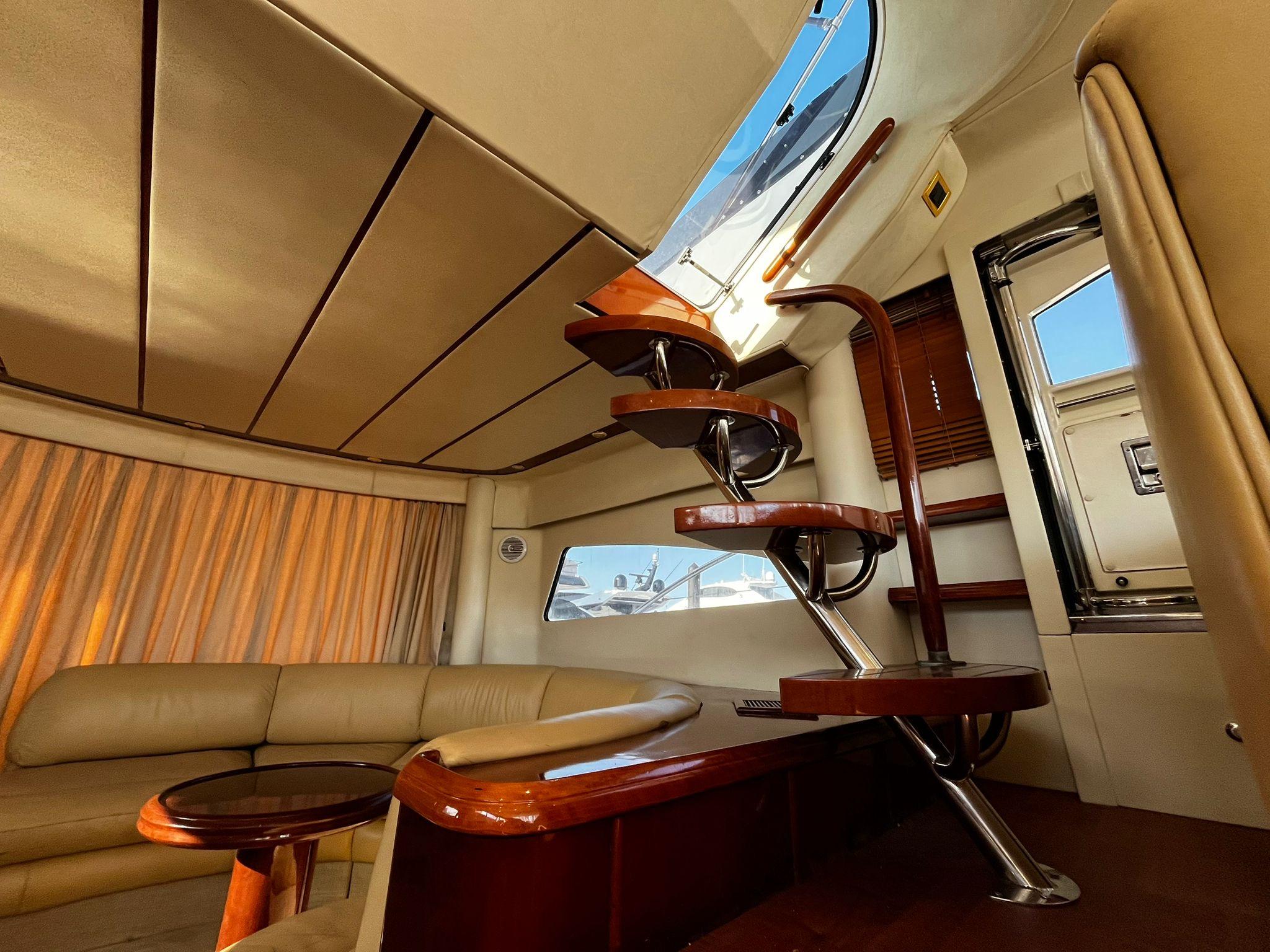 Fairline-Squadron 55 2001 -FL-US-Luxurious interior of 2001 Fairline Squadron 55 yacht with elegant staircase and seating area.-9778674 | Thumbnail