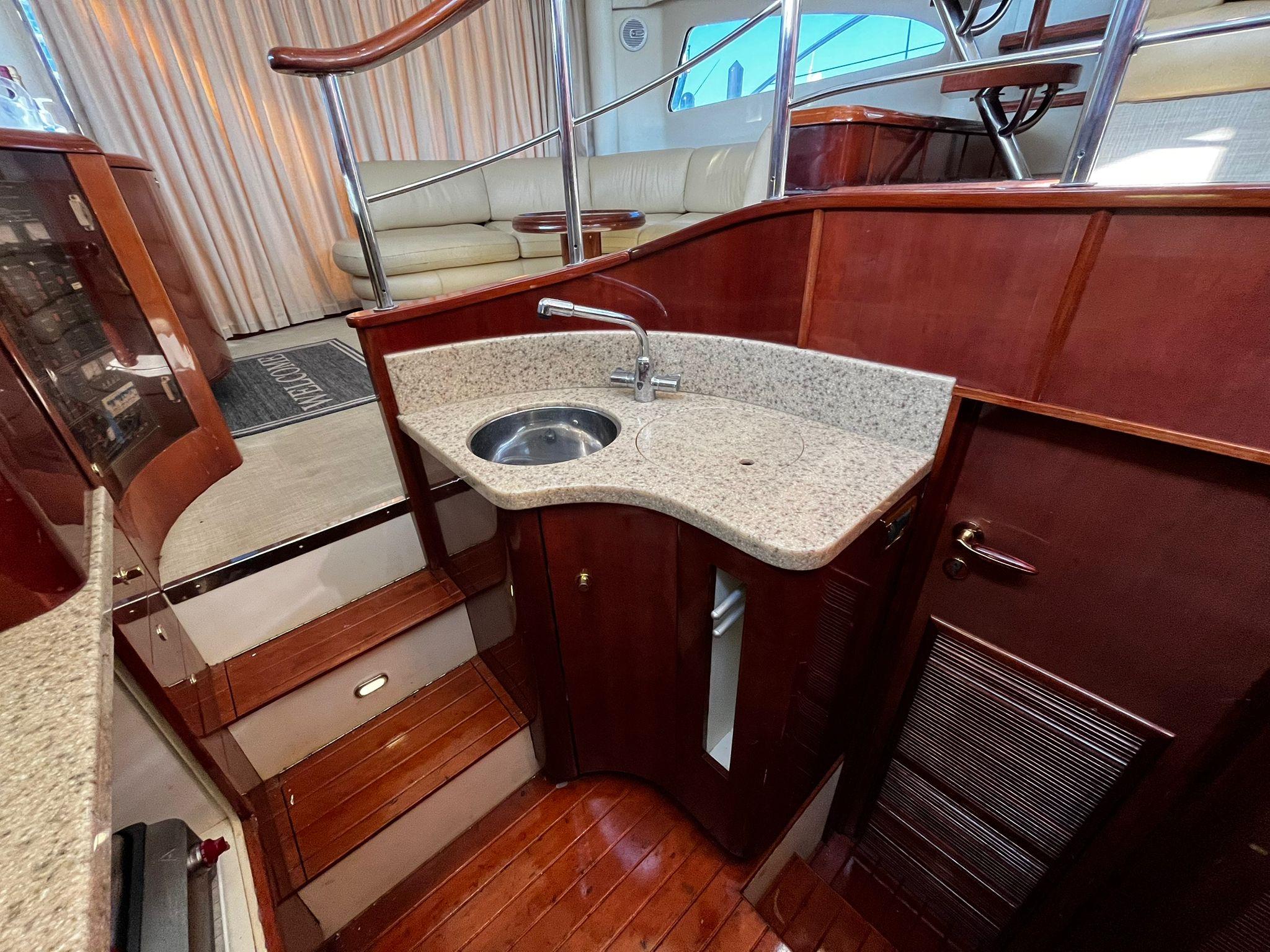 Fairline-Squadron 55 2001 -FL-US-Luxurious interior of 2001 Fairline Squadron 55 yacht with elegant wood and granite finishes.-9778674 | Thumbnail