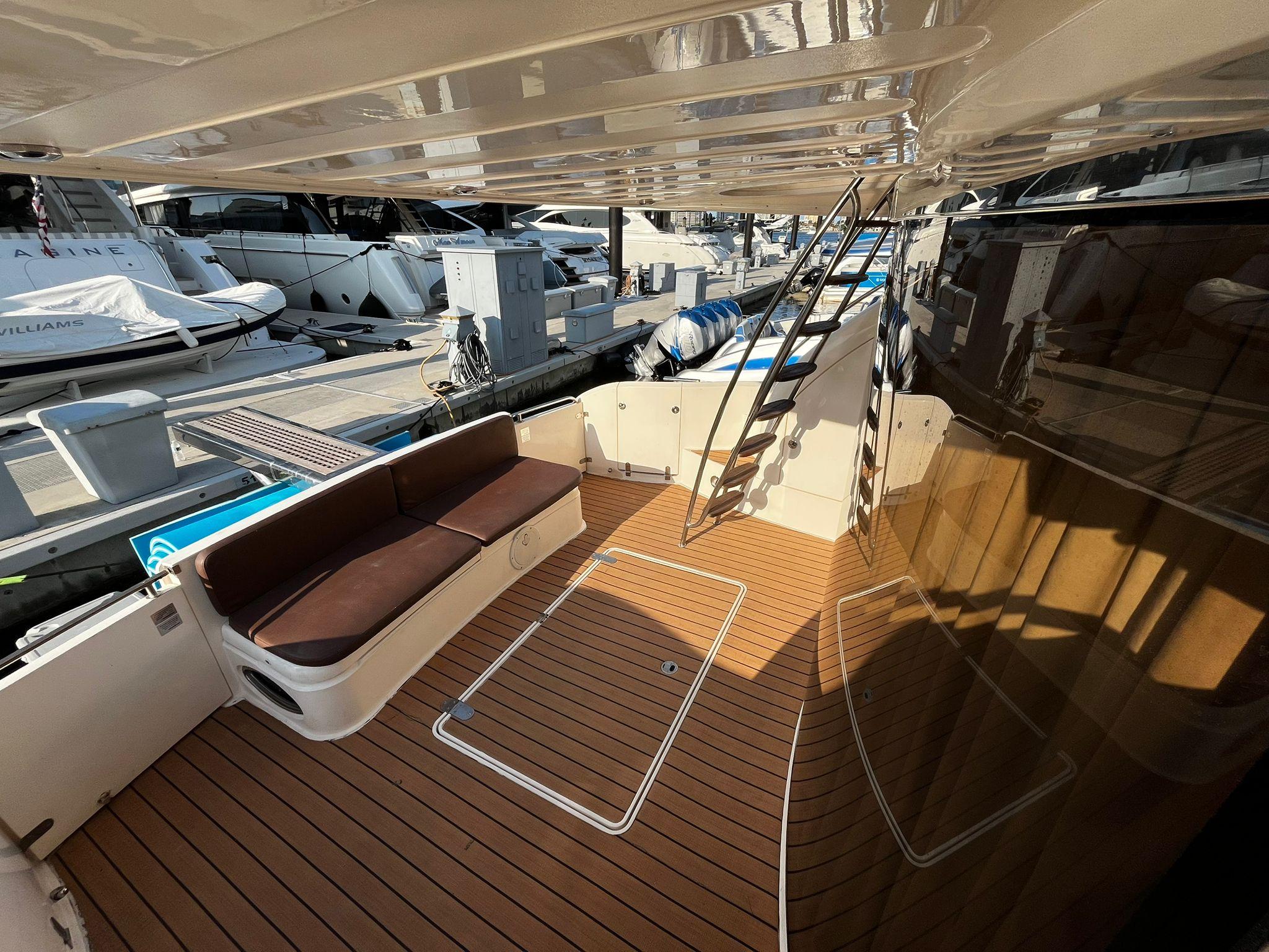 Fairline-Squadron 55 2001 -FL-US-Luxurious 2001 Fairline Squadron 55 yacht deck with seating and ladder.-9778674 | Thumbnail