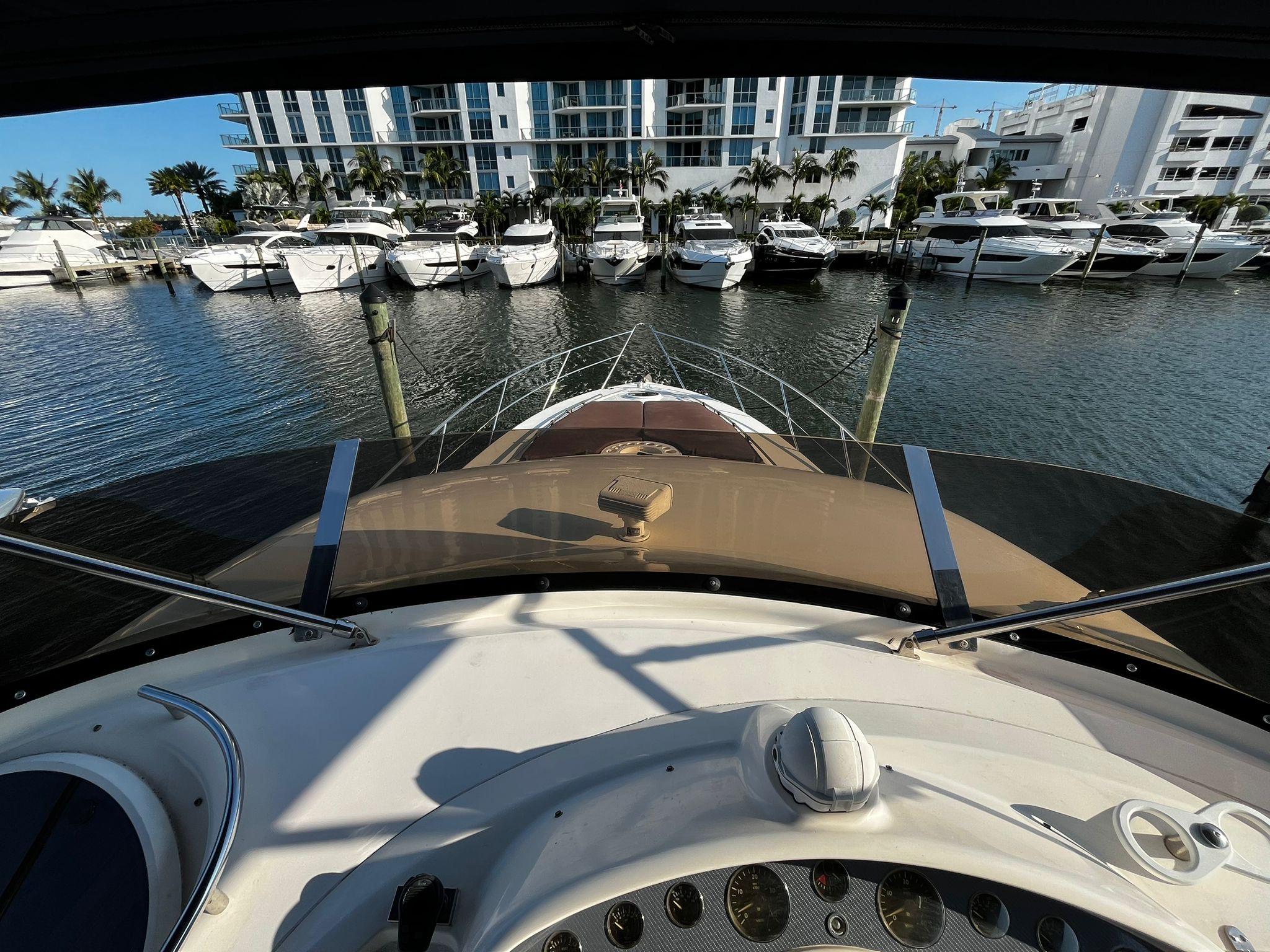 Fairline-Squadron 55 2001 -FL-US-View from the helm of a 2001 Fairline Squadron 55 yacht in a marina.-9778674 | Thumbnail